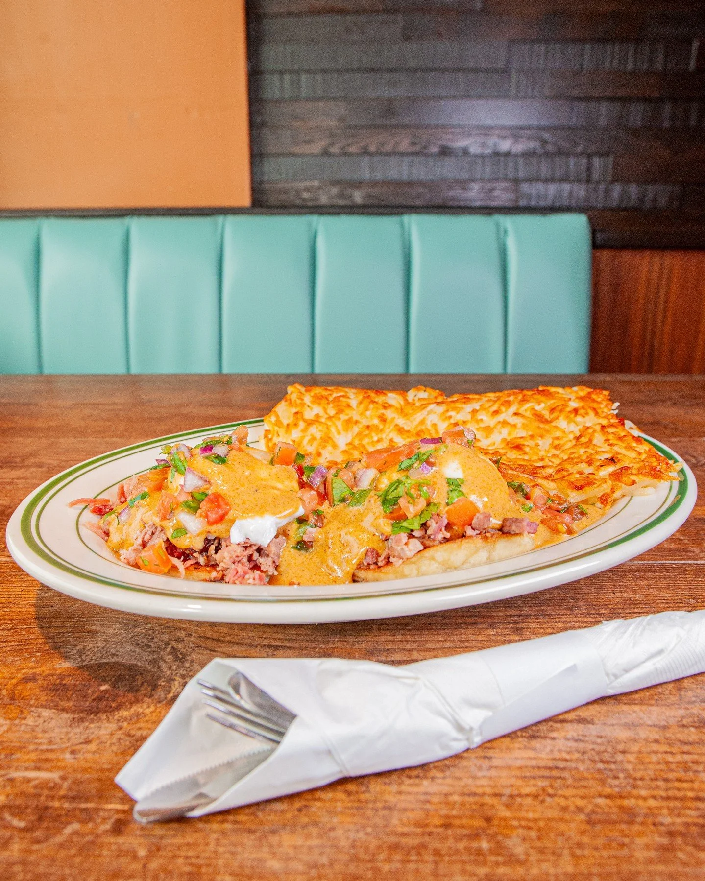 One of the stars from our seasonal Smokehouse Menu 🌟⁠
⁠
Ancho Eggs Benedict: beef brisket, poached eggs, and a grill-toasted English muffin, all topped with rich ancho hollandaise and fresh pico de gallo.⁠
⁠
This smokey, savory deliciousness is only
