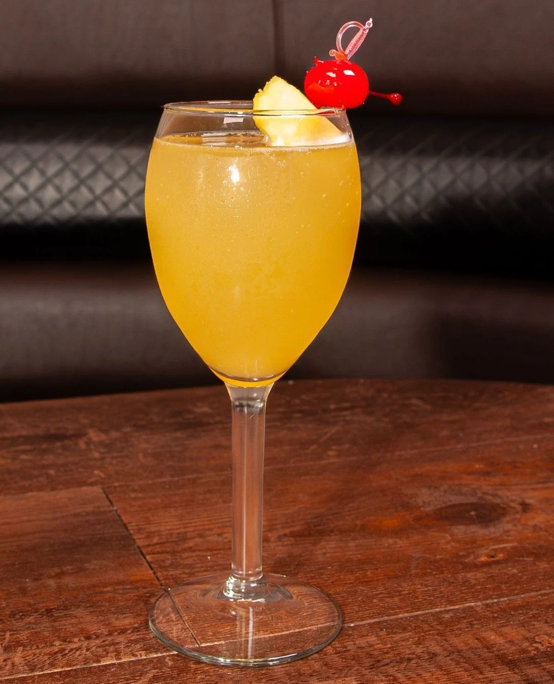 It's Momosa time!! We're serving up this special cocktail for Mother's Day! ⁠
⁠
Mom's Vacay is Barefoot Bubbly, pineapple juice and Parrot Bay coconut rum, garnished with a pineapple and cherry 🍍🥂🍒⁠
⁠
Cheers to the moms who deserve it all! 💕