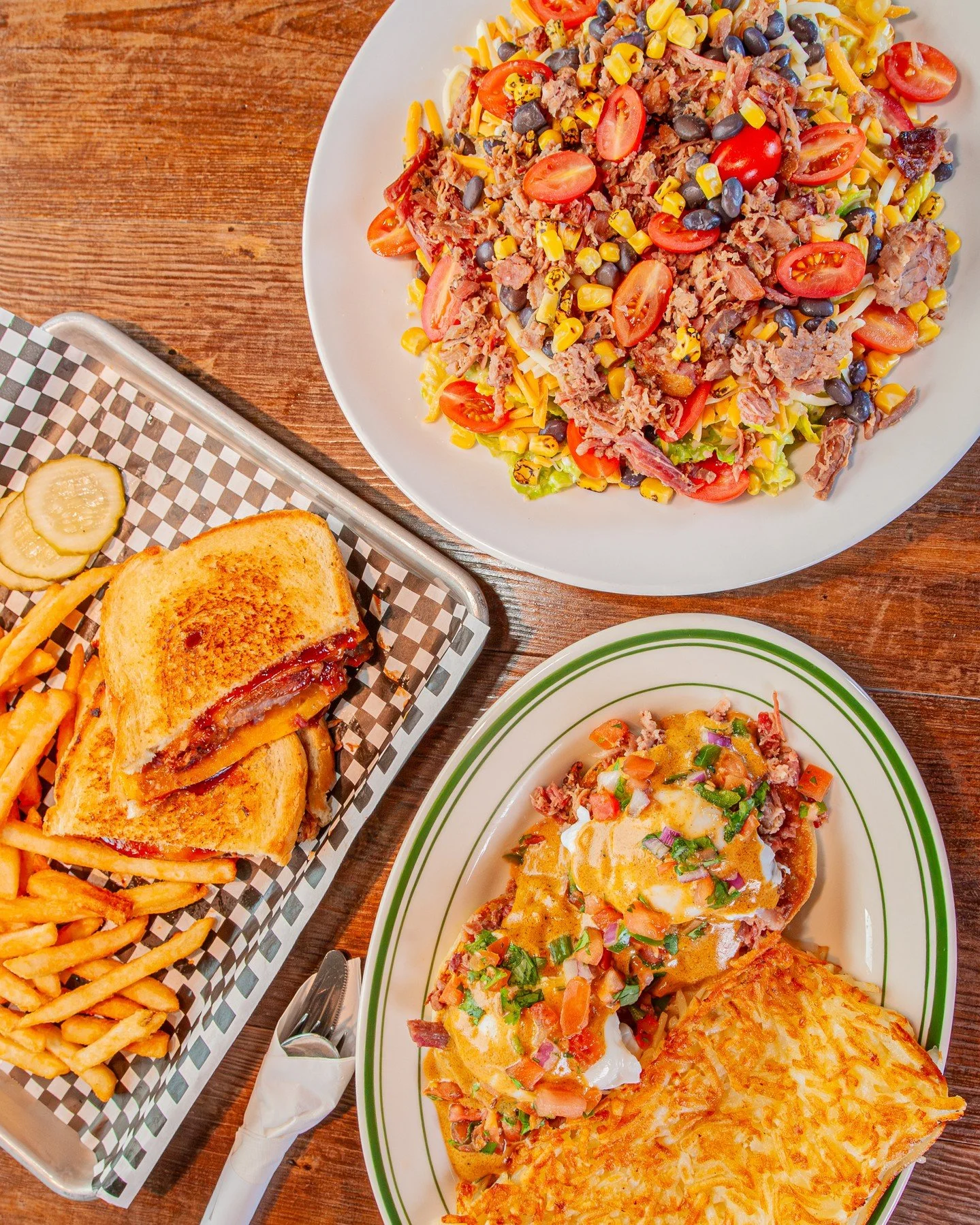 Our Smokehouse Menu has been such a hit so far! What's your fave?⁠
⁠
🍳 Ancho Eggs Benedict 🍳⁠
Two poached eggs and beef brisket on a grill-toasted English muffin. Topped with ancho hollandaise and Pico de Gallo and served with hashbrowns⁠
⁠
🥪 Smok