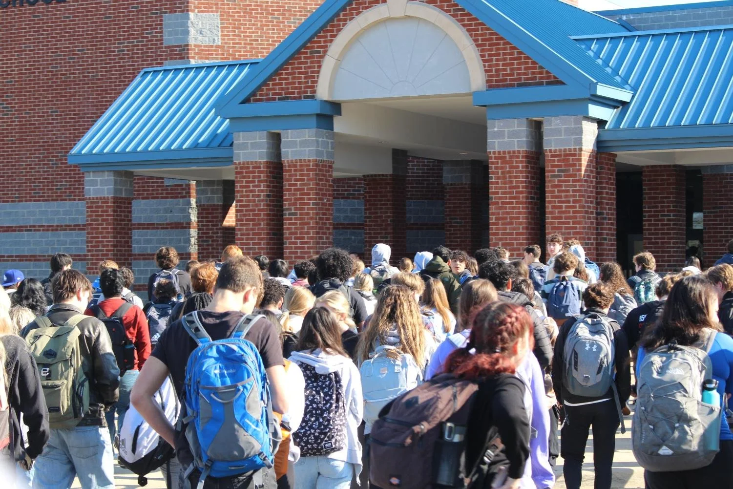  Students head back into the building for class after honor Lane Burrow’s life. (Caelan Jones) 