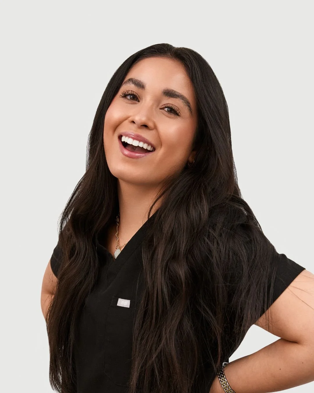 employee in scrubs photo smiling