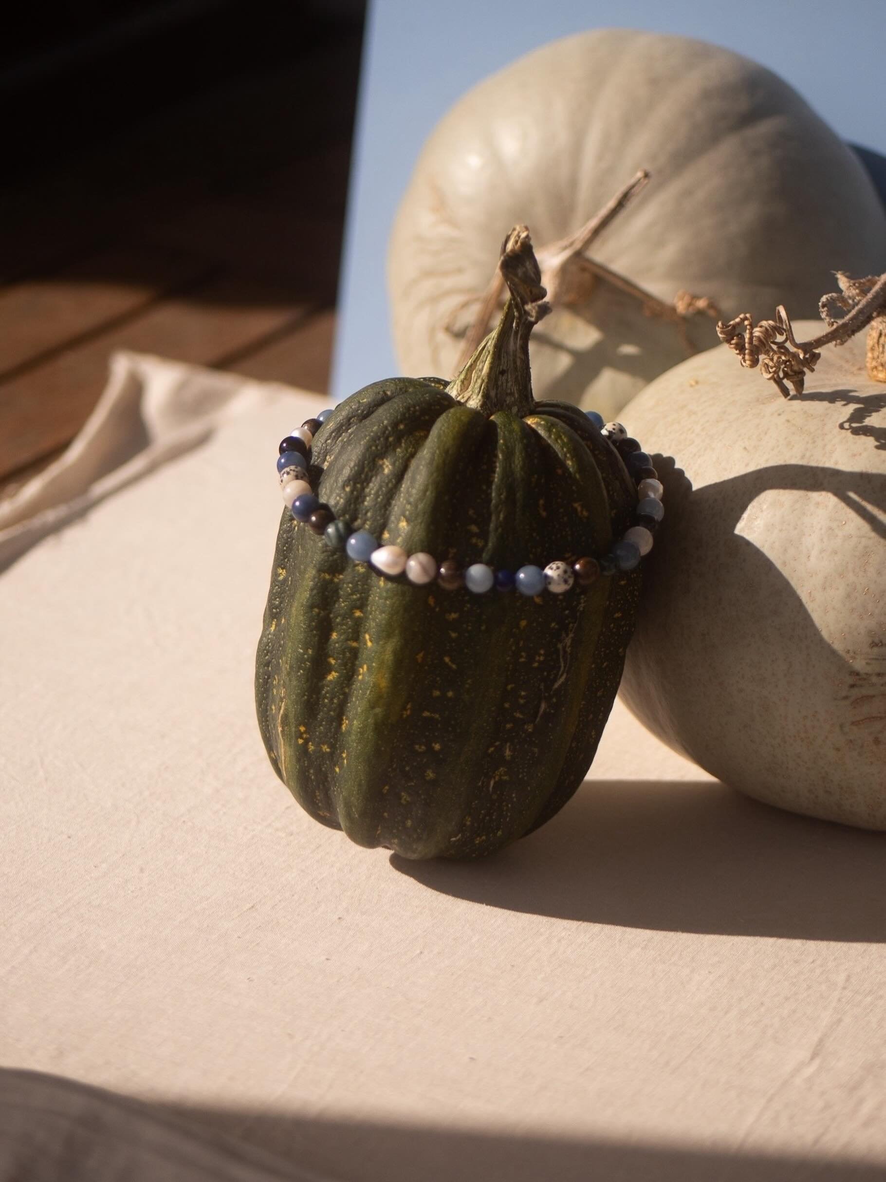 I made the Harvest necklace as an ode to the earthy tones that contrast against the crisp bluebird skies of Autumn. 
Just one of the best times of the year, in necklace form.
I hope it makes you feel cosy af, rugged up by the fire, cups of tea, potlu