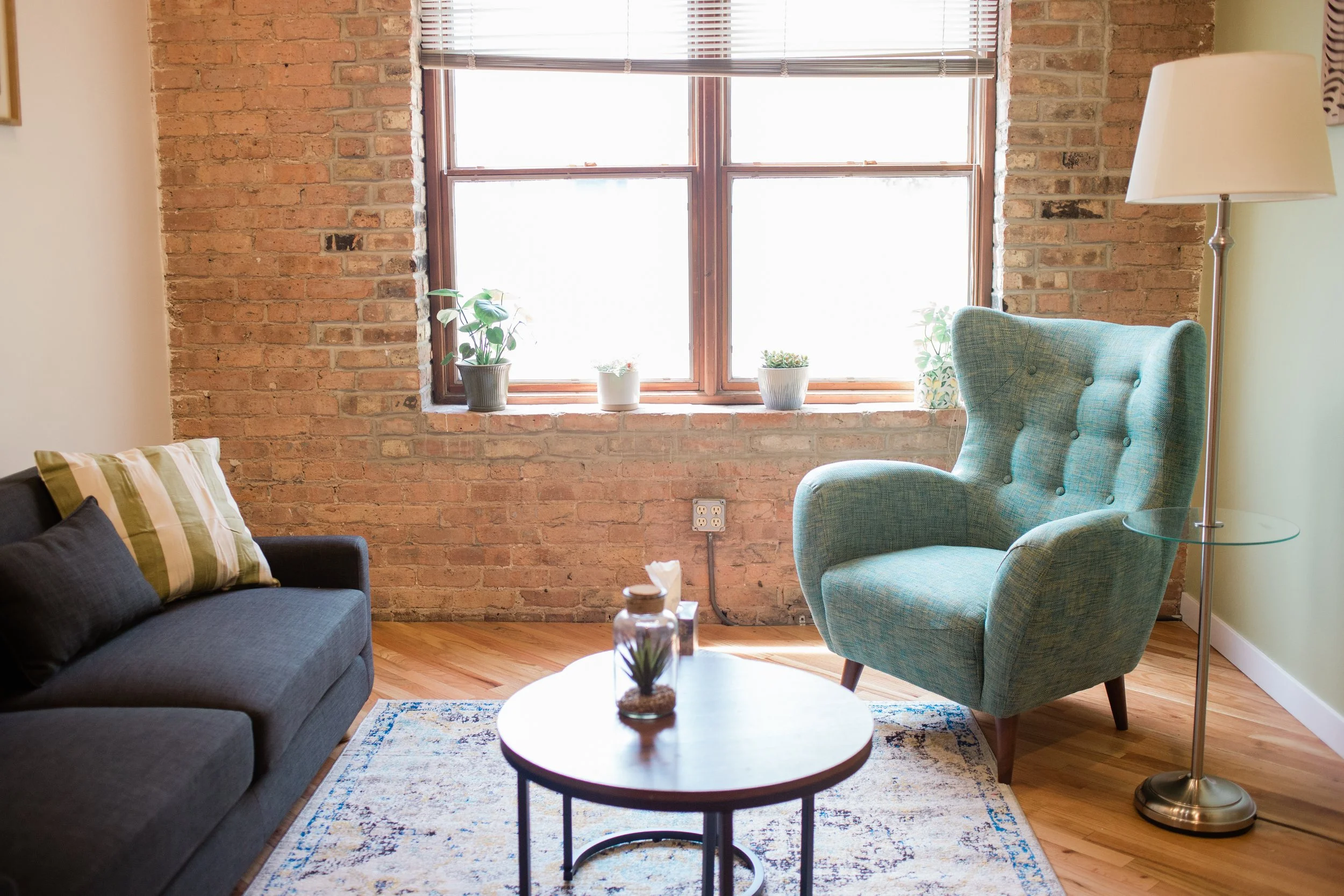 This is therapy office with a green chair