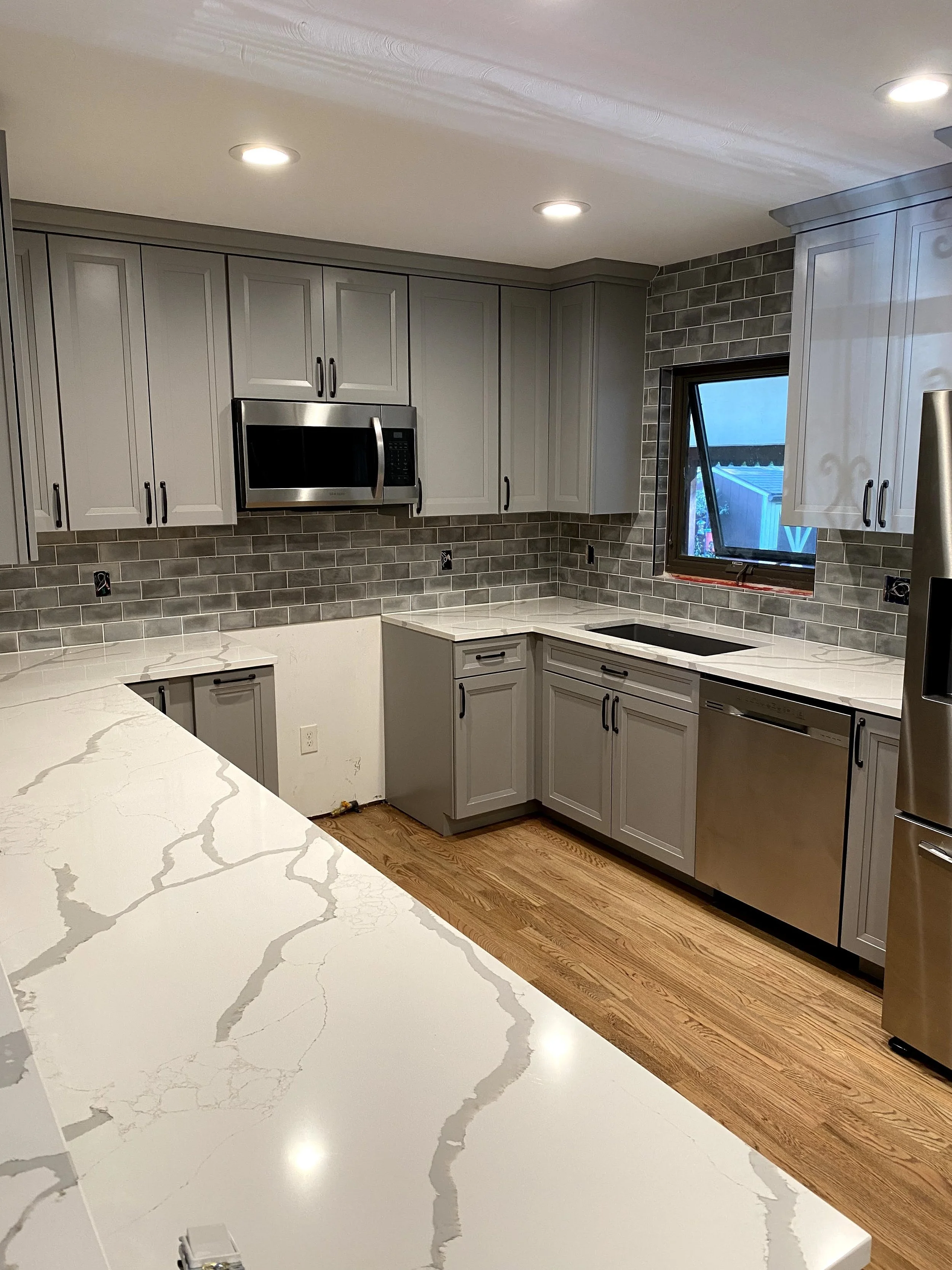 Contemporary Transitional Kitchen Remodel by M.H Craftsmanship project photo
