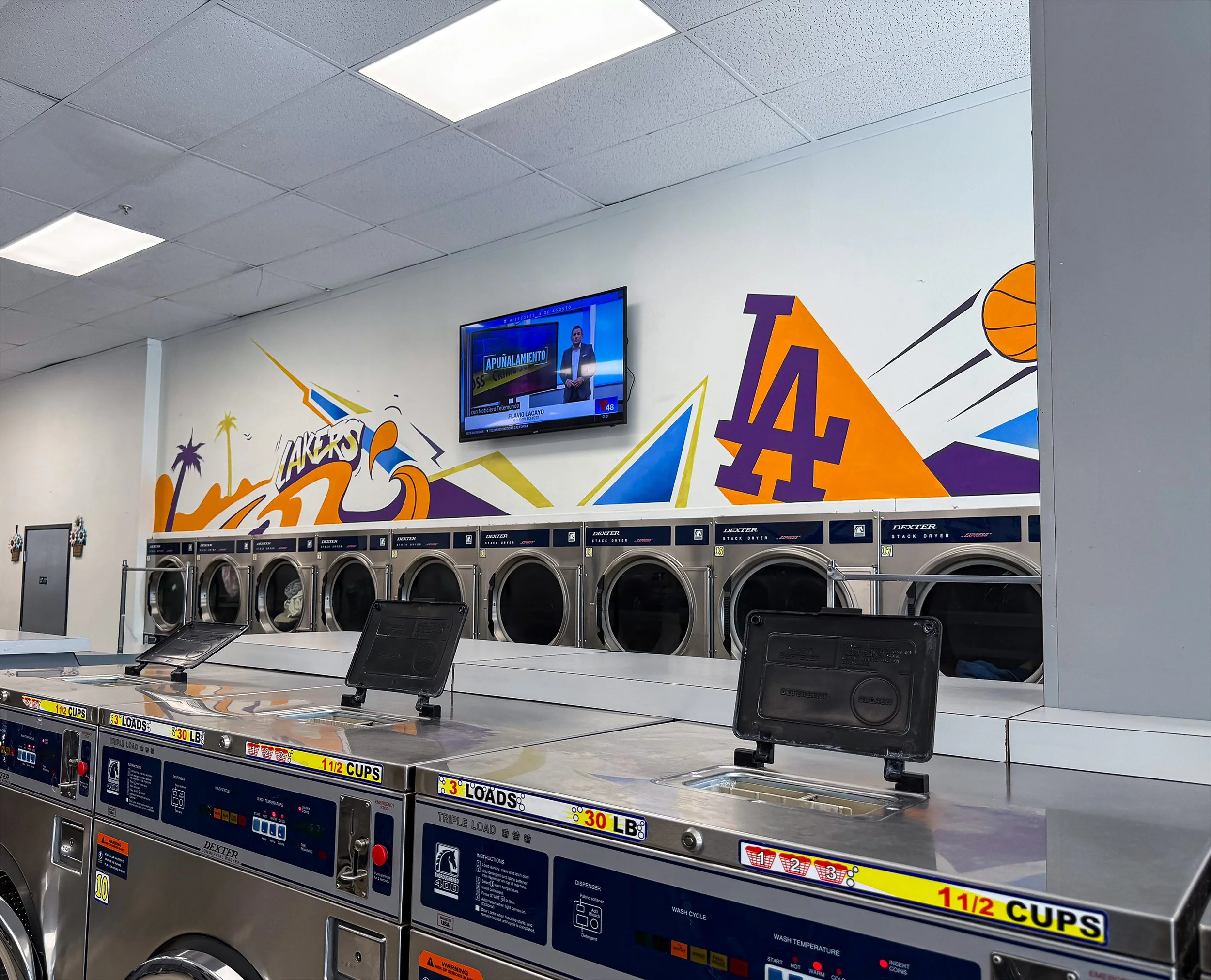Hand-painted Los Angeles Lakers and Dodgers graphic mural for laundromat interior Los Angeles by Pezer97 2025
