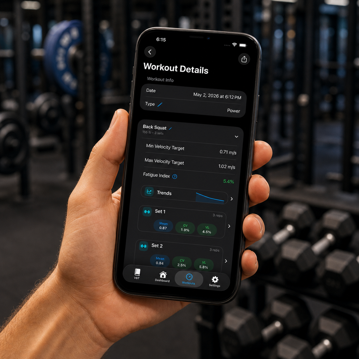 Athlete viewing AccelIntel workout performance data on iPhone after strength training