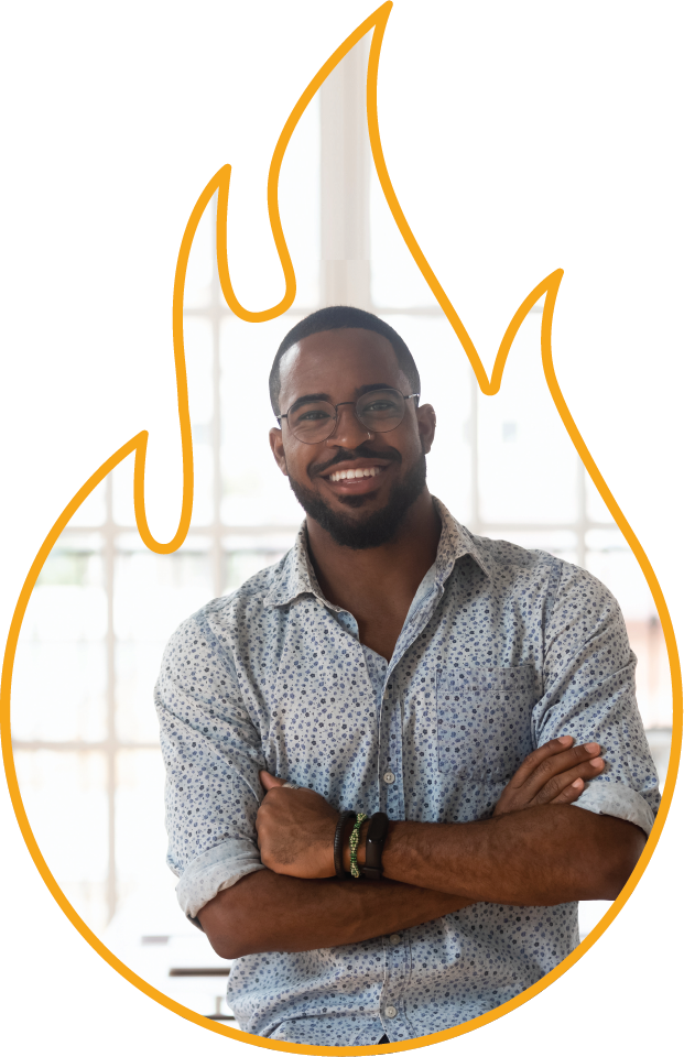 Smiling leader standing with arms crossed