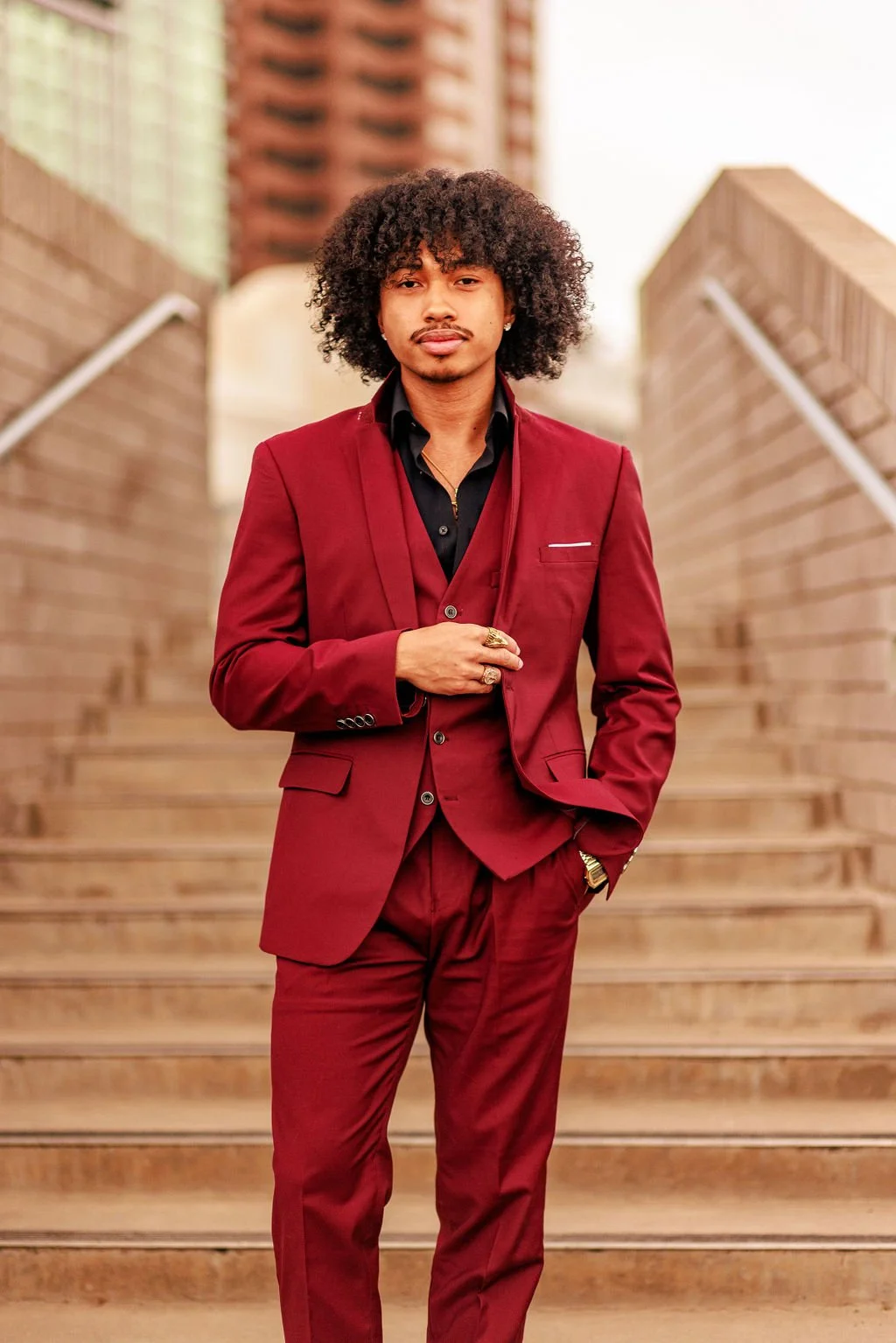 Jaylin Koneke, a local Phoenix, Arizona model, showcasing a custom tailored suit during a modeling session in Downtown Phoenix.