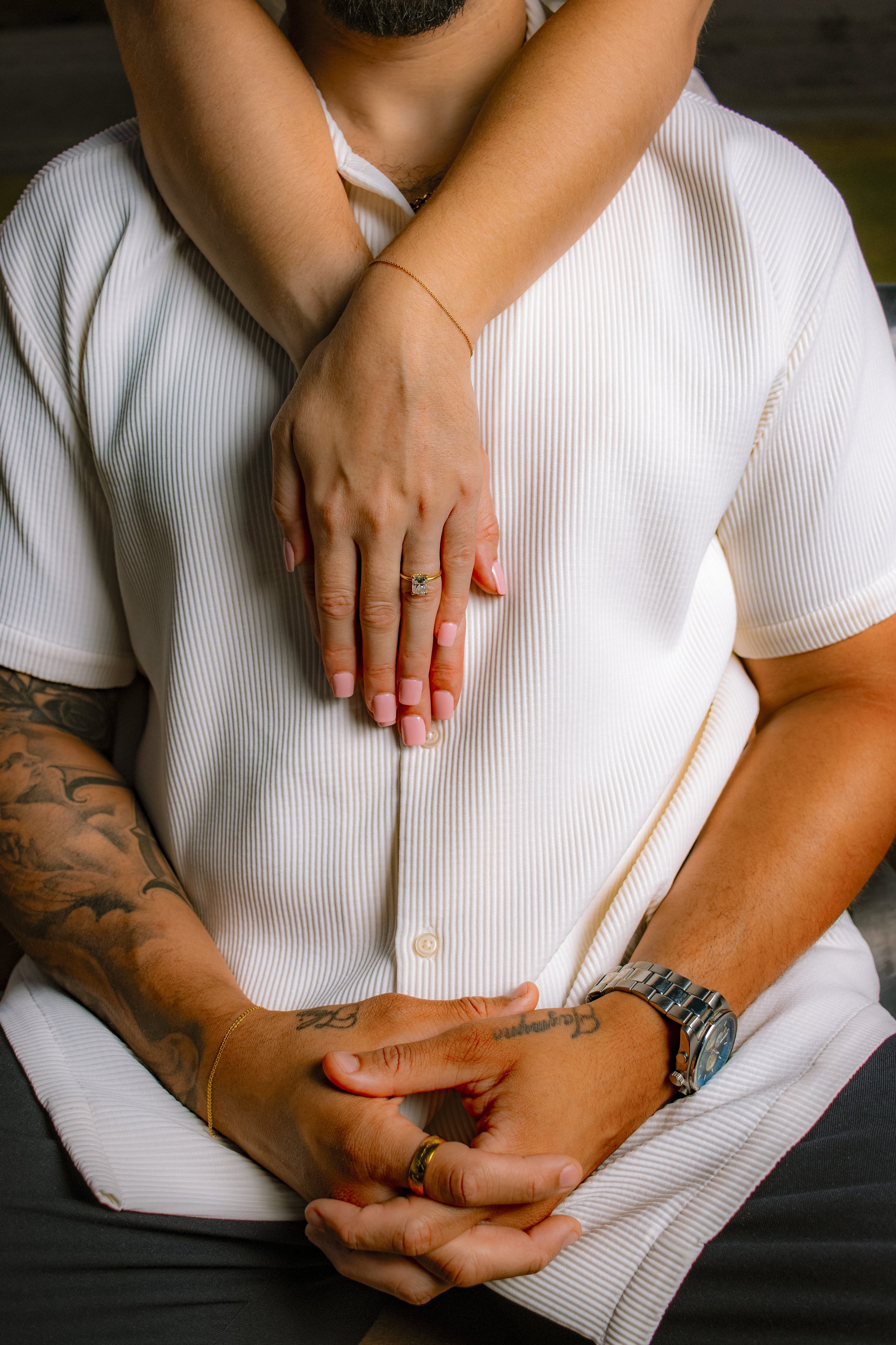 Phoenix engagement photographer capturing ring detail shot of couple hands during Scottsdale engagement session
