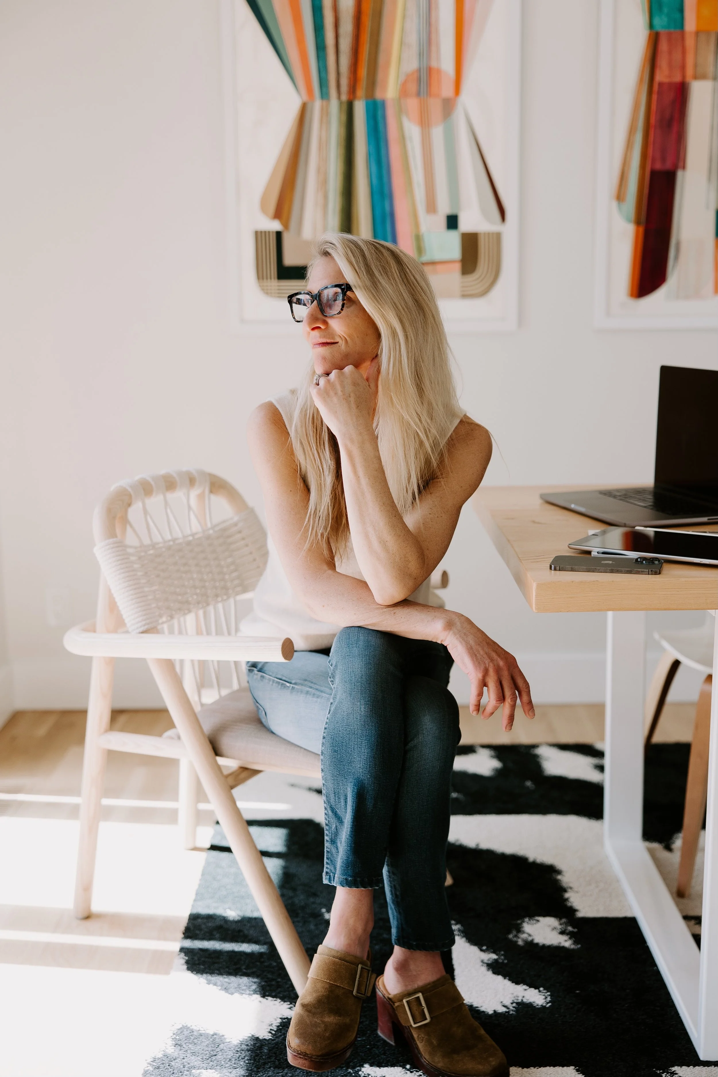 headshot lori - in chair .jpg
