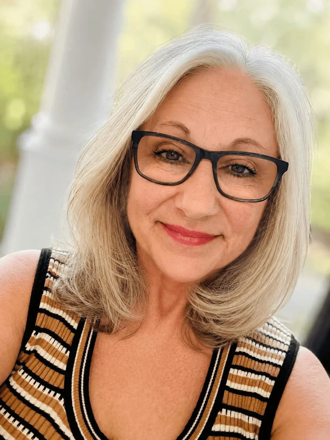 Lisa Assetta, founder of CANcer Life Organizing, smiling outdoors