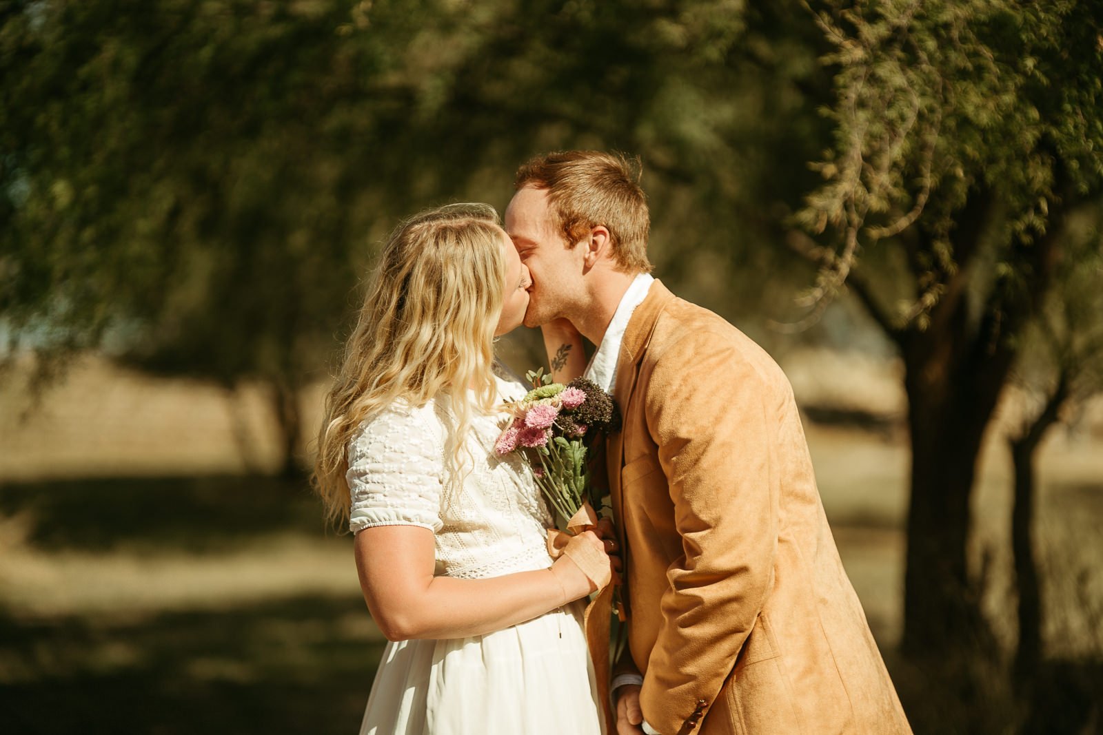 Sawyer and Nikki kissing each other after their ceremony.