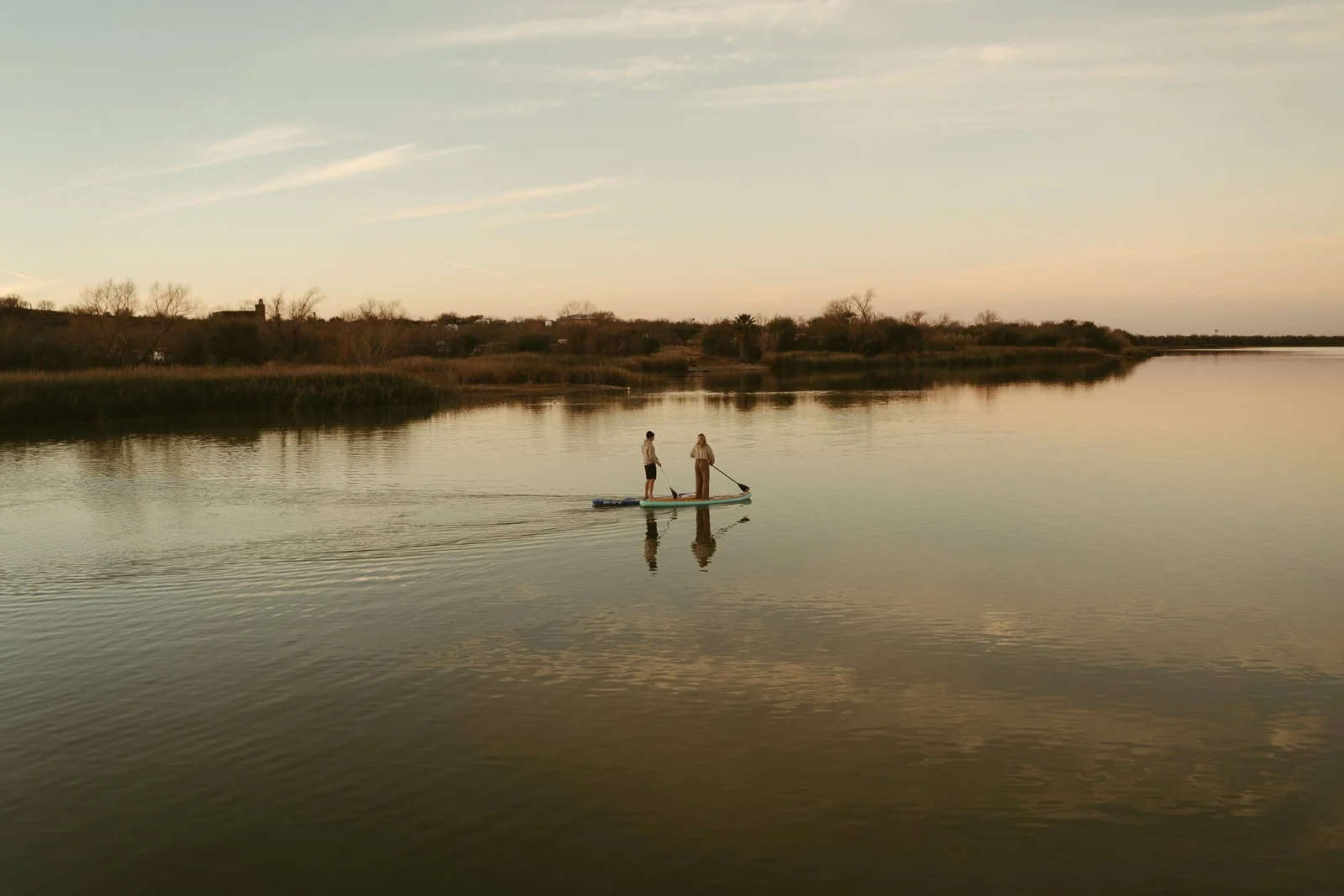 Sawyer and Nikki paddling out to the middle of Lake Casa Blanca that morning.