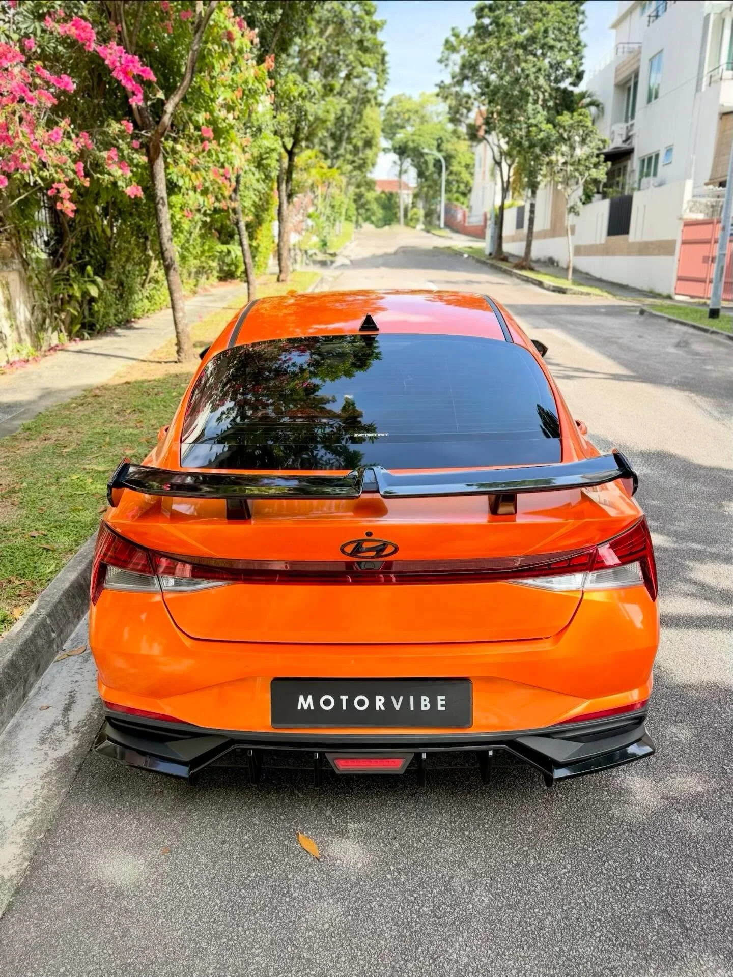🟩 Available for Sale 

Wrapped in a Lamborghini inspired orange, what was once a practical sedan now radiates attitude, confidence and undeniable street presence. The sculpted body kit sharpens every angle, giving the Hyundai Avante (Mar 2022) a low