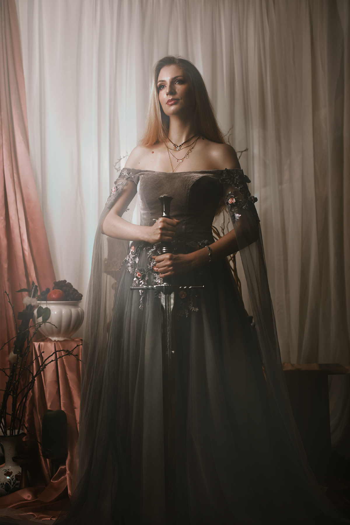 Dark fantasy cosplay portrait with candlelight, jewelry and romantic styling. Fine art photography inspired by gothic romance, historical fashion and storytelling. Moody, painterly imagery with rich textures and soft dramatic light.