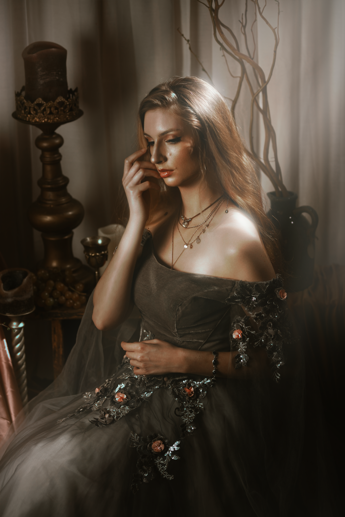 Dark fantasy cosplay portrait with candlelight, jewelry and romantic styling. Fine art photography inspired by gothic romance, historical fashion and storytelling. Moody, painterly imagery with rich textures and soft dramatic light.