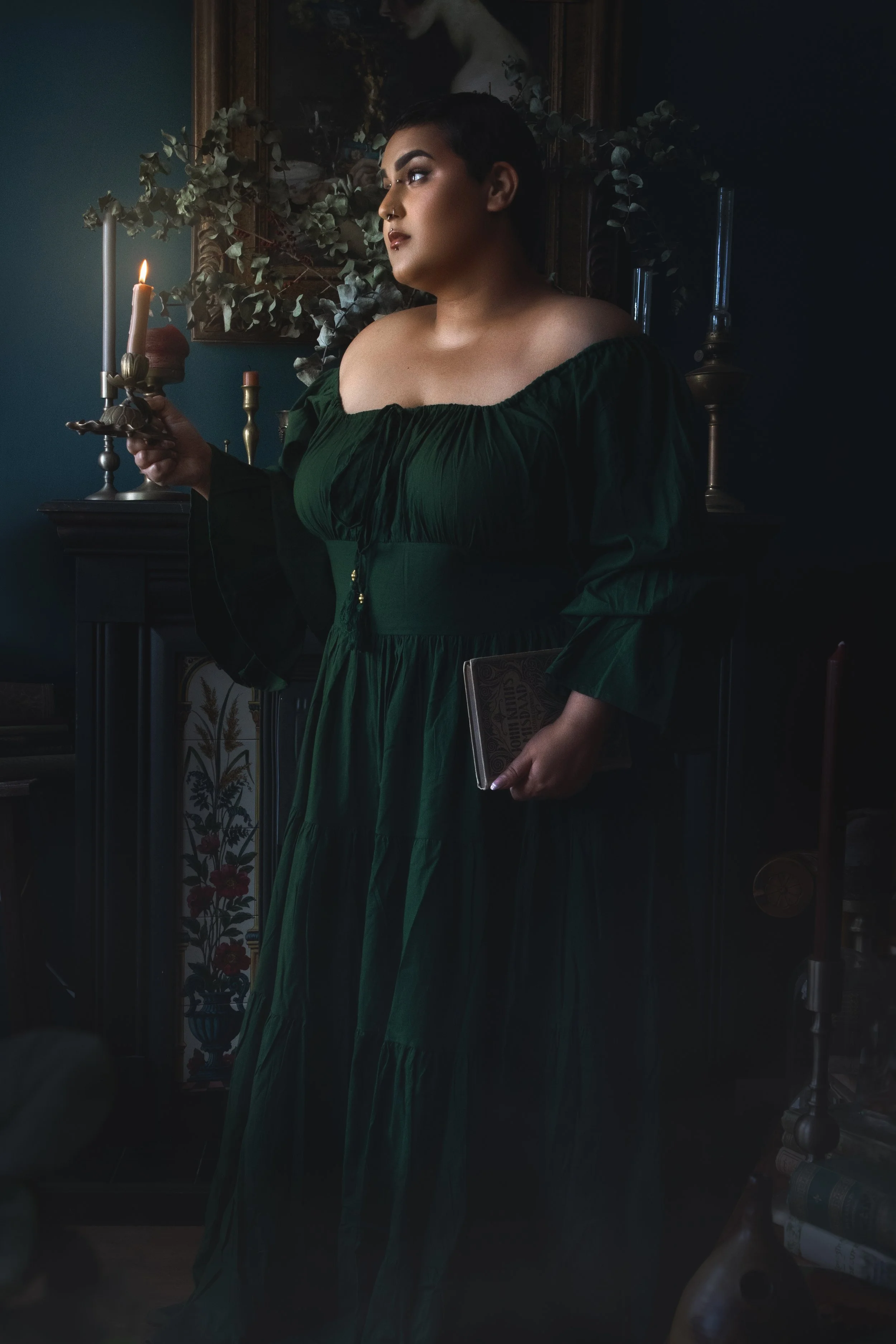 Dreamy fine art portrait of Neesha with rich green and crimson tones, inspired by folklore and classical paintings. Romantic, painterly fantasy photography featuring flowers, water and soft candlelight. Emotional storytelling imagery in a fine art st
