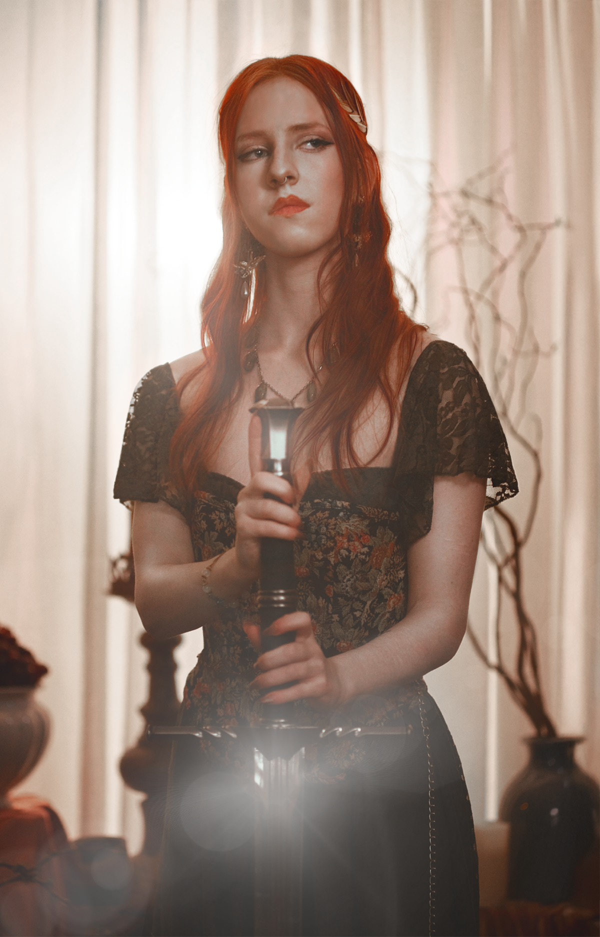 Dark fantasy cosplay portrait with candlelight, jewelry and romantic styling. Fine art photography inspired by gothic romance, historical fashion and storytelling. Moody, painterly imagery with rich textures and soft dramatic light.