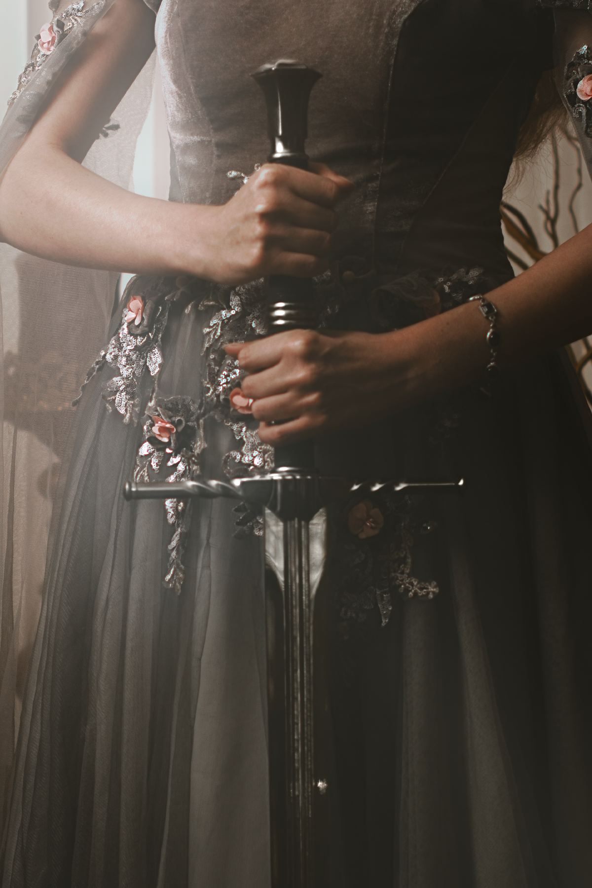 Dark fantasy cosplay portrait with candlelight, jewelry and romantic styling. Fine art photography inspired by gothic romance, historical fashion and storytelling. Moody, painterly imagery with rich textures and soft dramatic light.