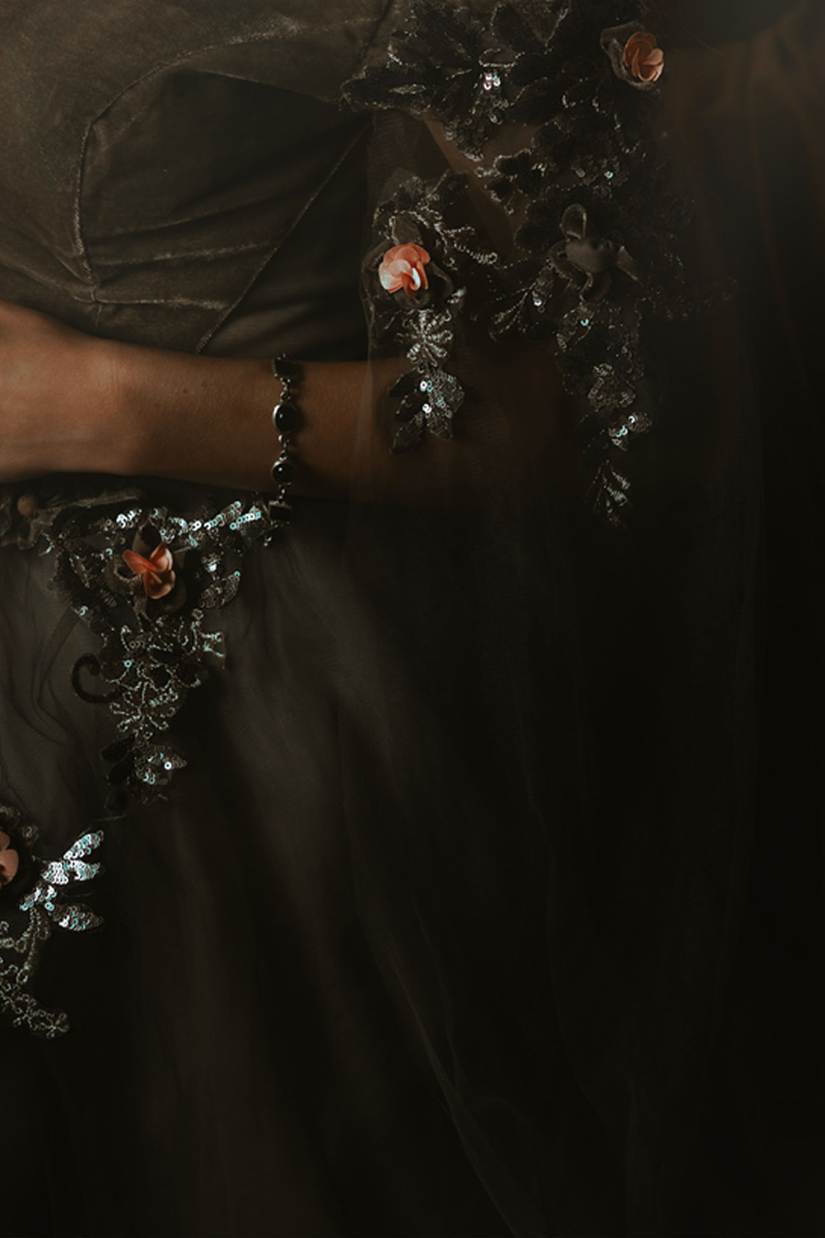 Dark fantasy cosplay portrait with candlelight, jewelry and romantic styling. Fine art photography inspired by gothic romance, historical fashion and storytelling. Moody, painterly imagery with rich textures and soft dramatic light.