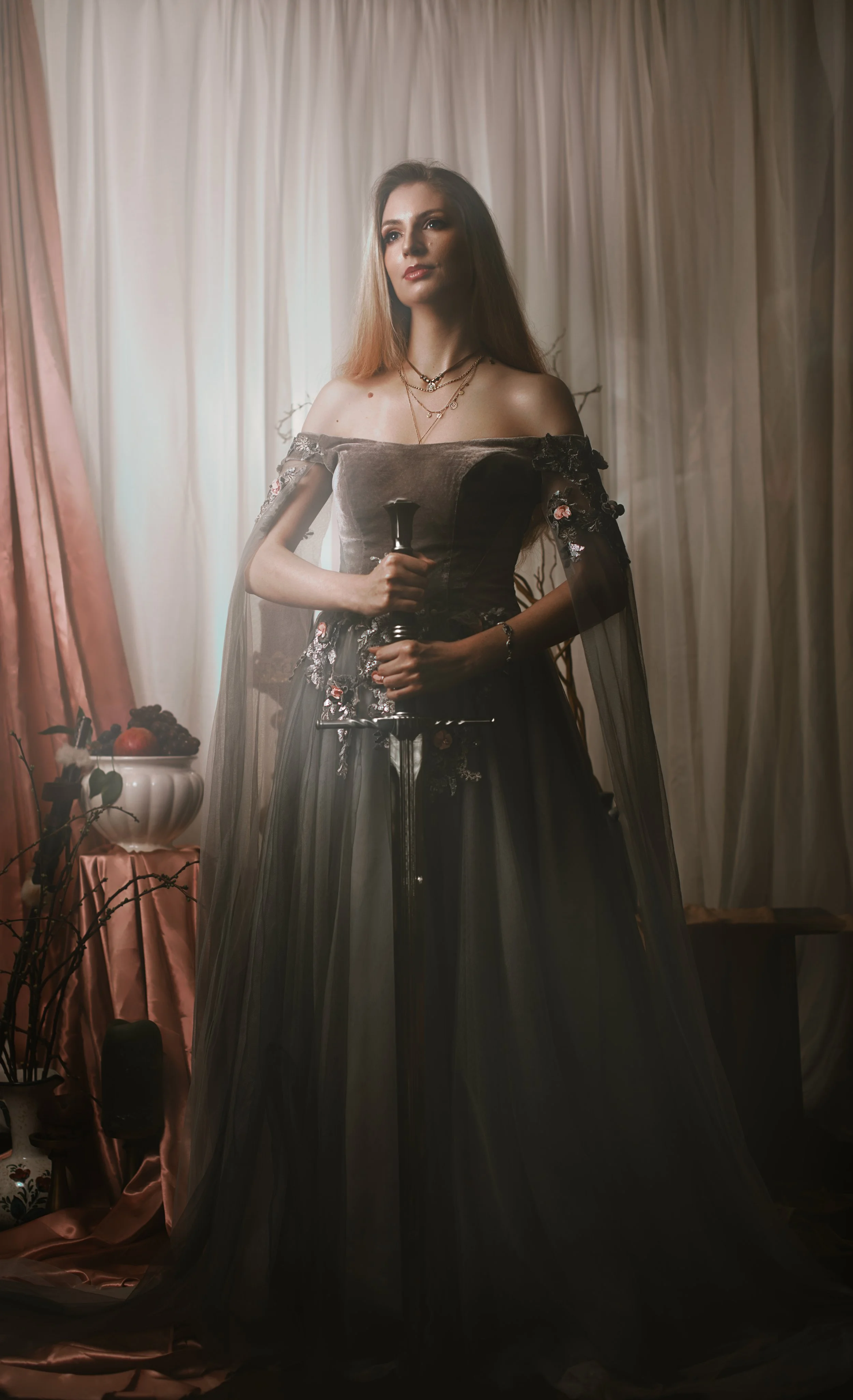 Dark fantasy cosplay portrait with candlelight, jewelry and romantic styling. Fine art photography inspired by gothic romance, historical fashion and storytelling. Moody, painterly imagery with rich textures and soft dramatic light.