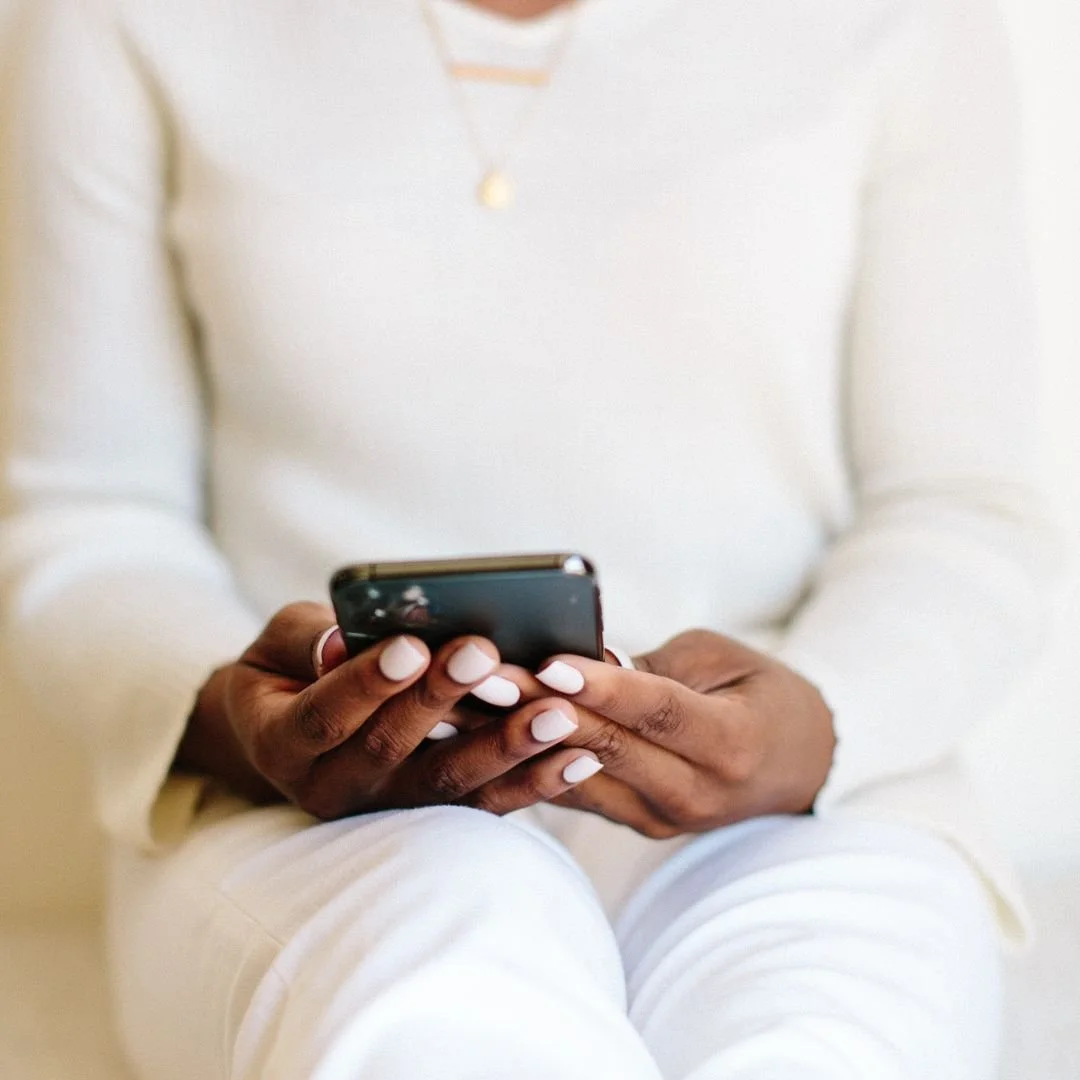 Selfie of Insurance career coach Sandra working at a coffee shop