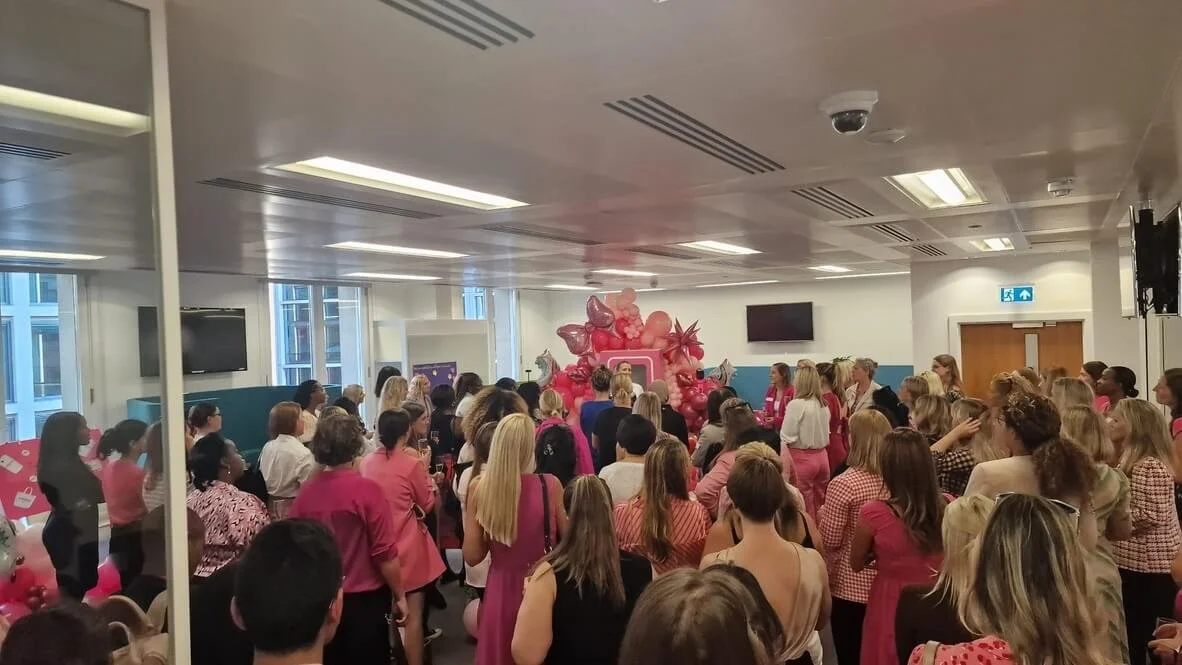 Over the shoulder shot of audience at a 100 Women in Insurance community event