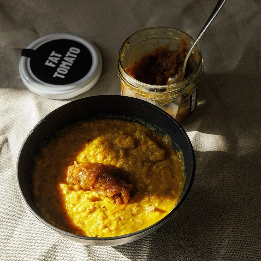 There&rsquo;s something about dark, grey, damp days that calls for a pot of dahl gently bubbling on the stove.

Red lentils. Tomatoes. Coconut milk.
Fresh turmeric and ginger root. A little garlic.
Plenty of toasted spices.

And a spoonful or two of 