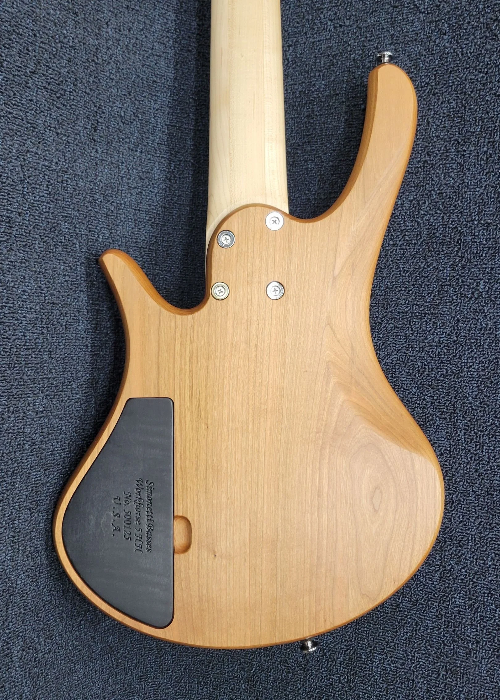 Threaded insert with machine screw neck attachment.