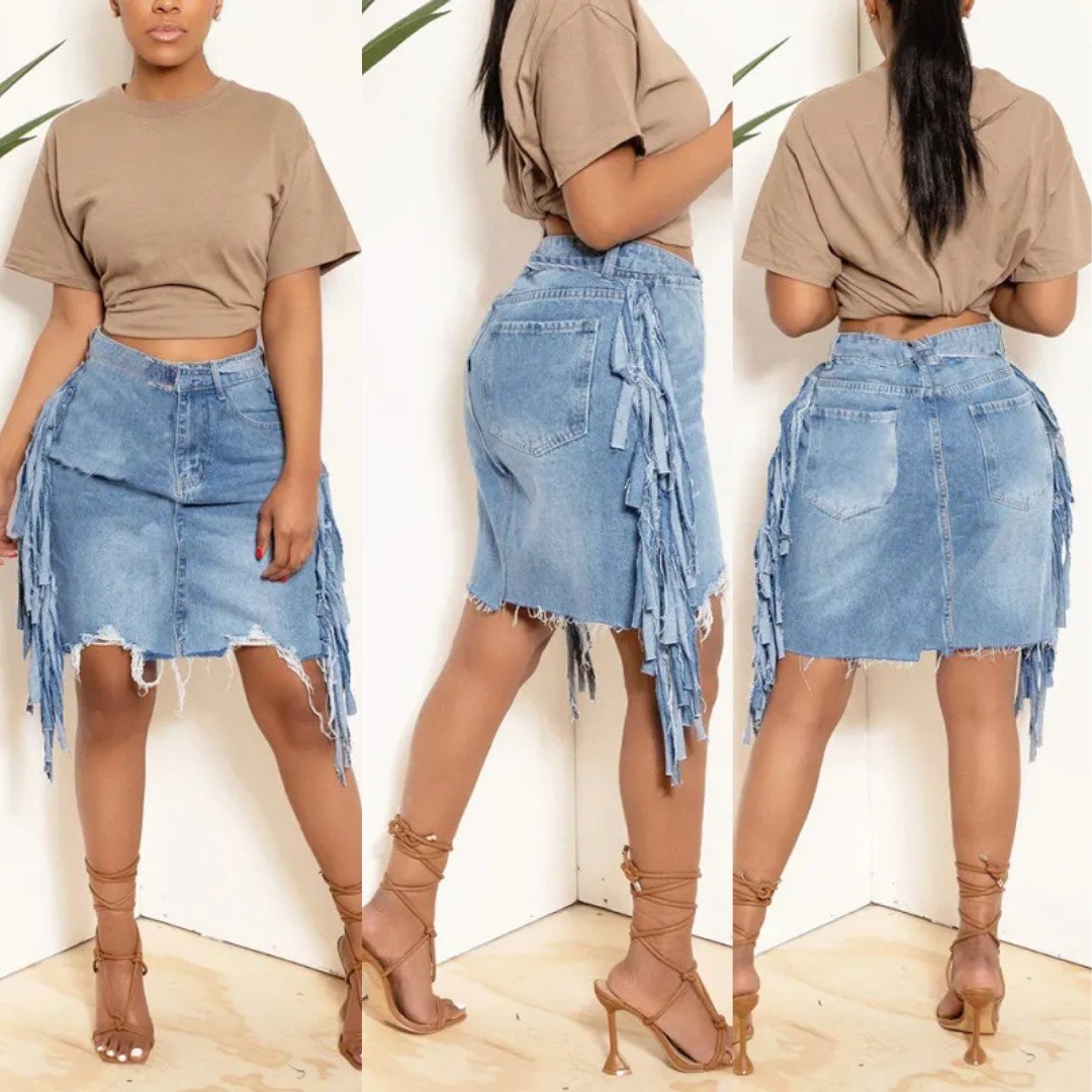 👖✨ Introducing the newest addition to our denim collection: the Tasseled Denim Skirt! 🌟 

Perfect for pairing with your favorite strappy sandals and a comfy t-shirt or tank for a laid-back yet stylish look. Embrace the boho-chic vibes and elevate y