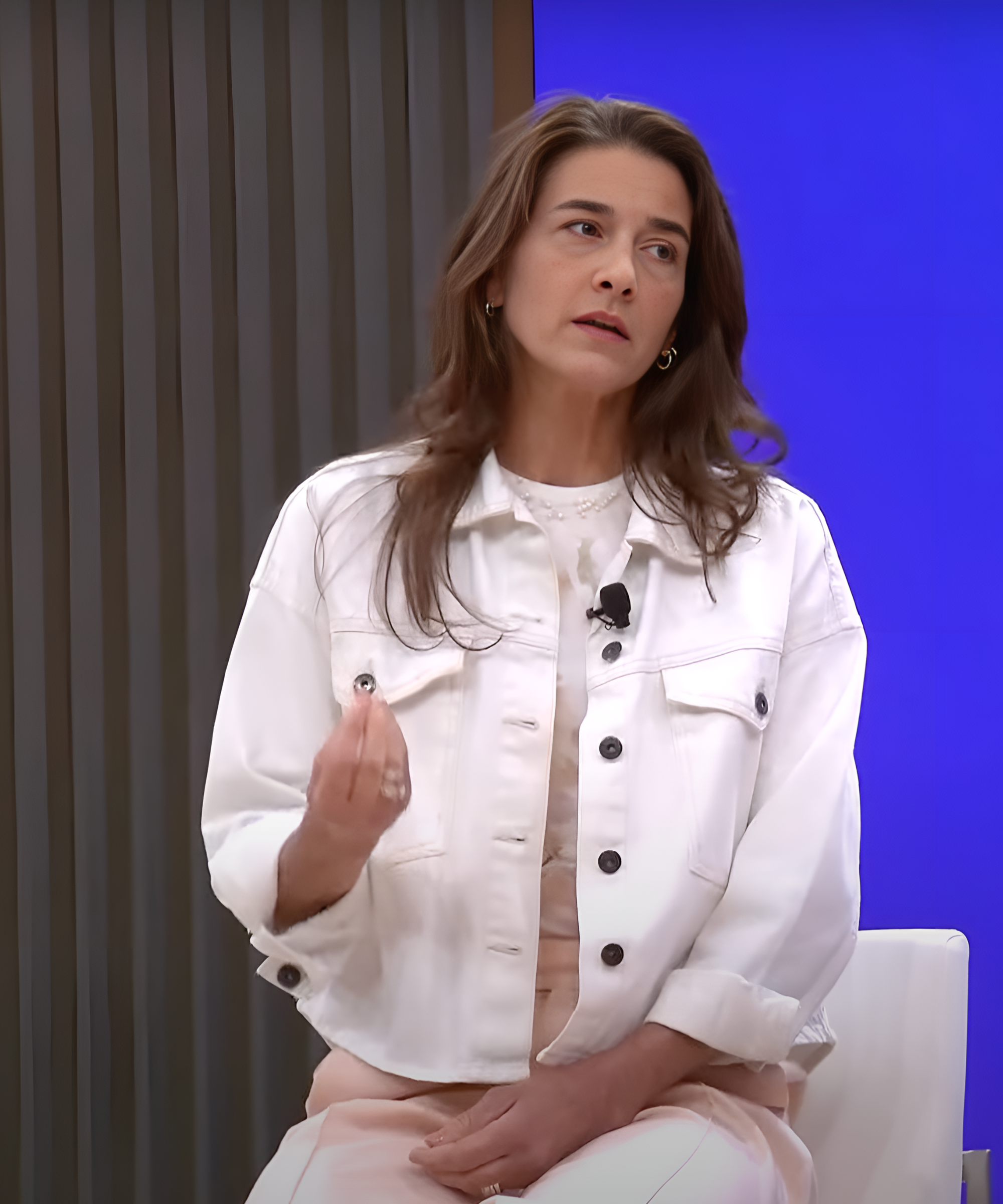 Candid image of Lisa speaking on a panel at an industry event.