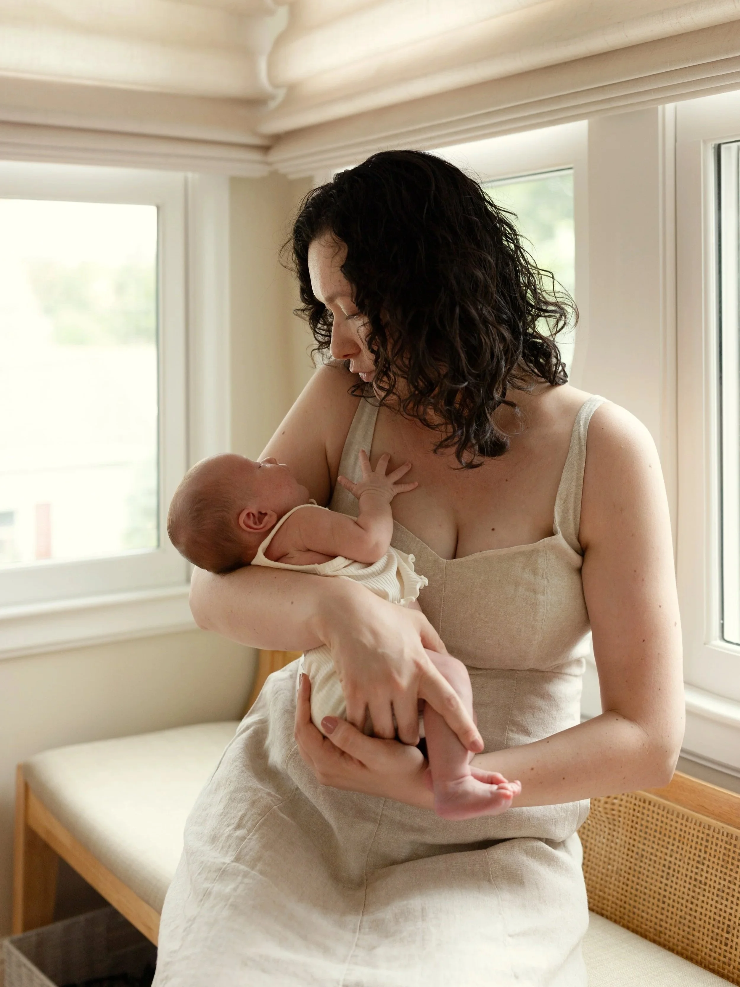 mother and baby newborn at home photo