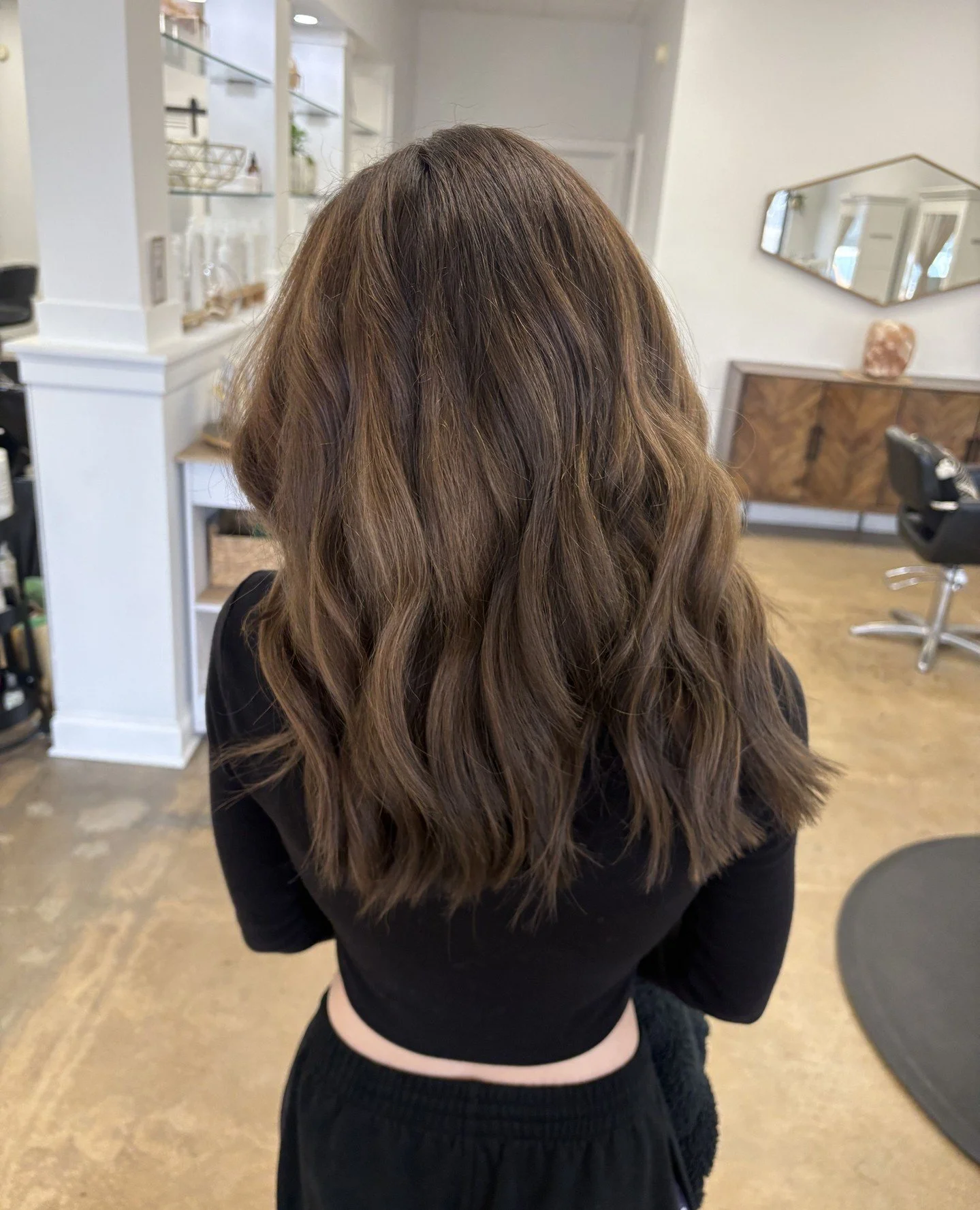 Rich, glossy, and full of depth. Carley created this brunette using organic based hair color for a tone that feels effortless and healthy for your hair.⁠
⁠
The beauty of a brunette shade is how it reflects light and enhances natural shine. It&rsquo;s
