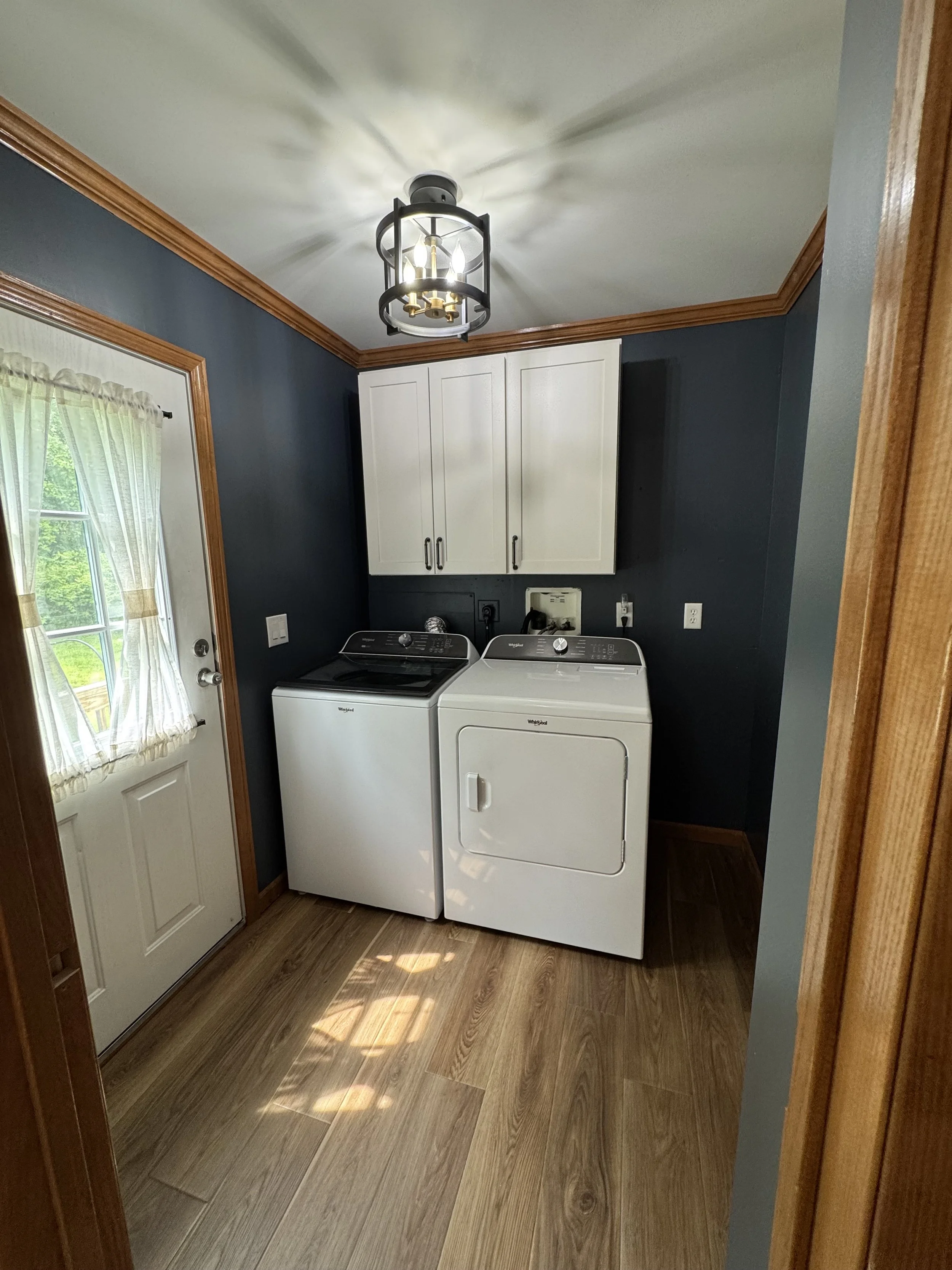 First Floor Remodel -Laundry - Spring 2025 - Glacier cabinetry, Shaw LVP flooring, MSI Quartz, Tile backsplash, Delta Touch Faucet