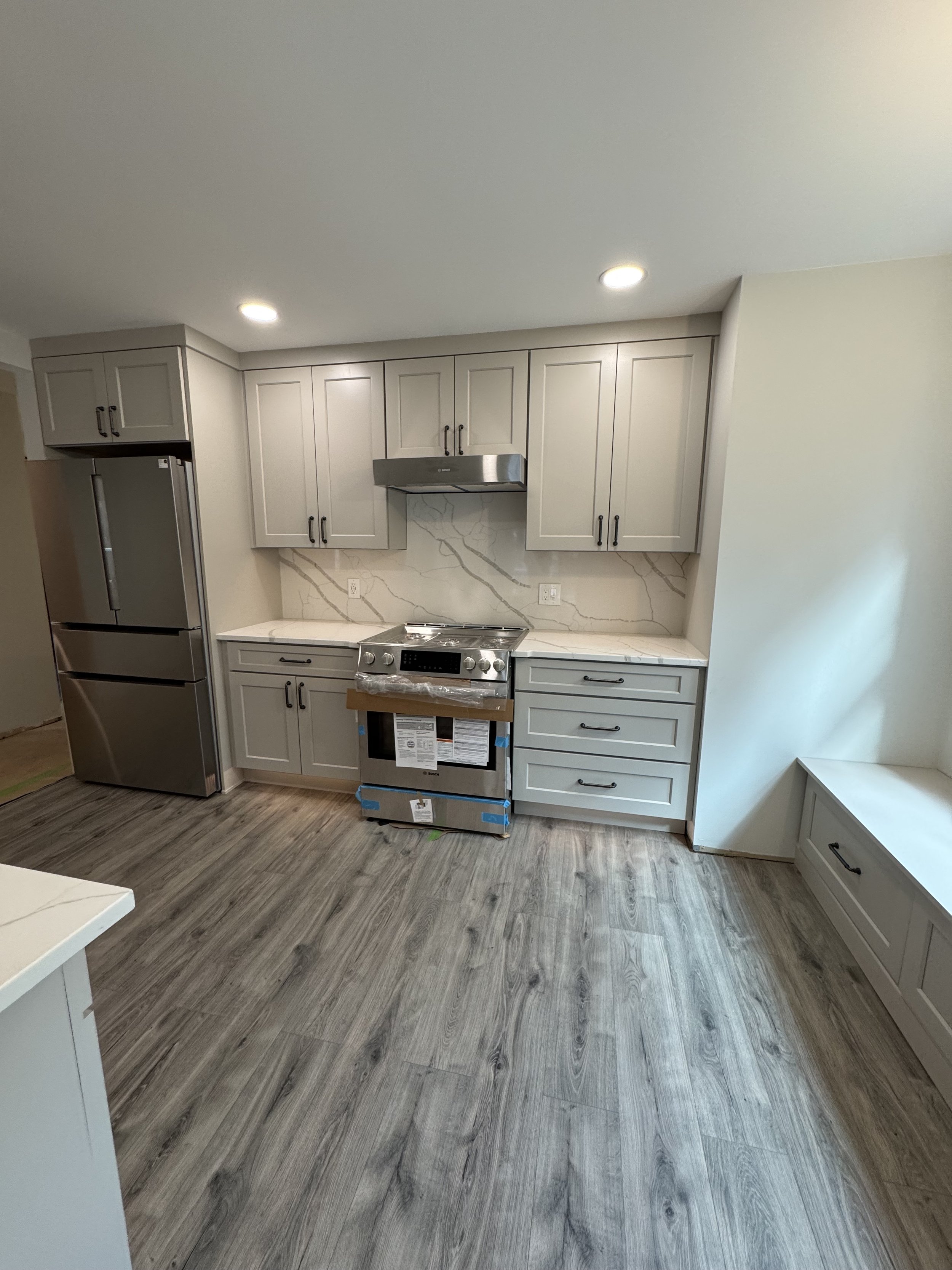 Kitchen Remodel - Spring 2025 - Legend Cabinetry Denali Pebble, Pental Quartz countertop and full height backsplash 