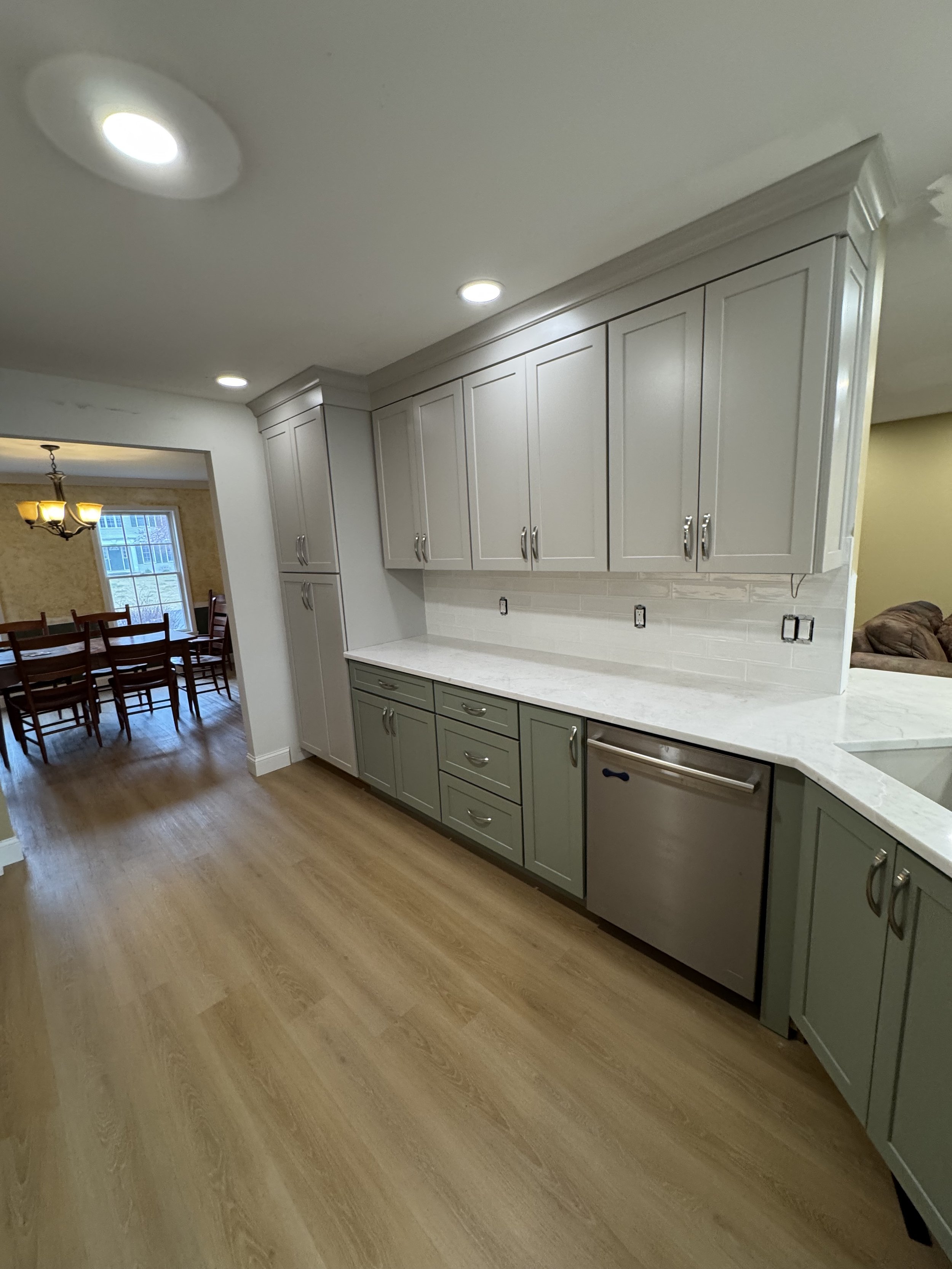 First Floor Remodel - Spring 2025 - Legend Cabinetry, Calacatta Miraggio Cove Quartz, Tile backsplash, MSI Valleyview Grove flooring 