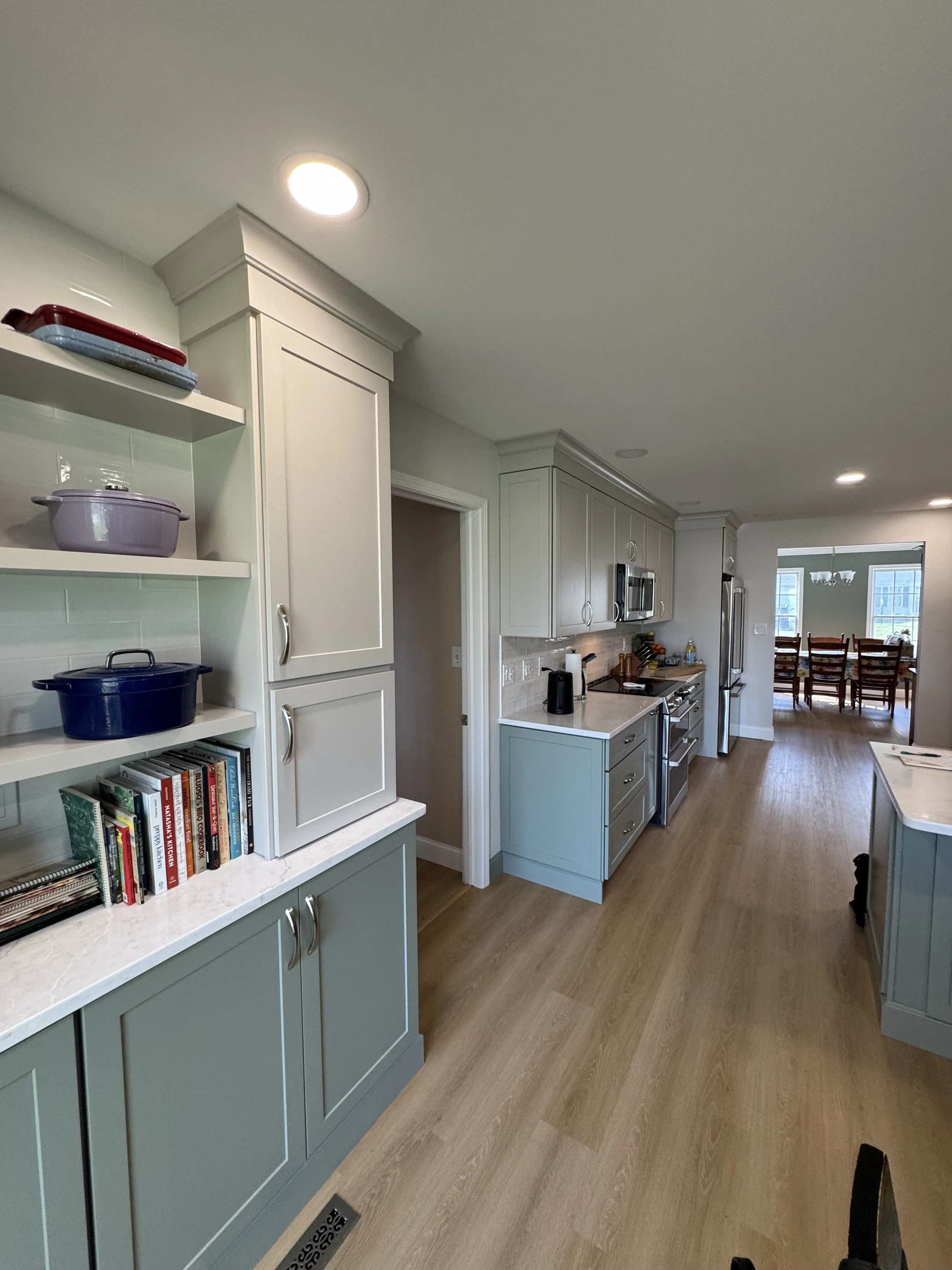 First Floor Remodel - Spring 2025 - Legend Cabinetry, Calacatta Miraggio Cove Quartz, Tile backsplash, MSI Valleyview Grove flooring