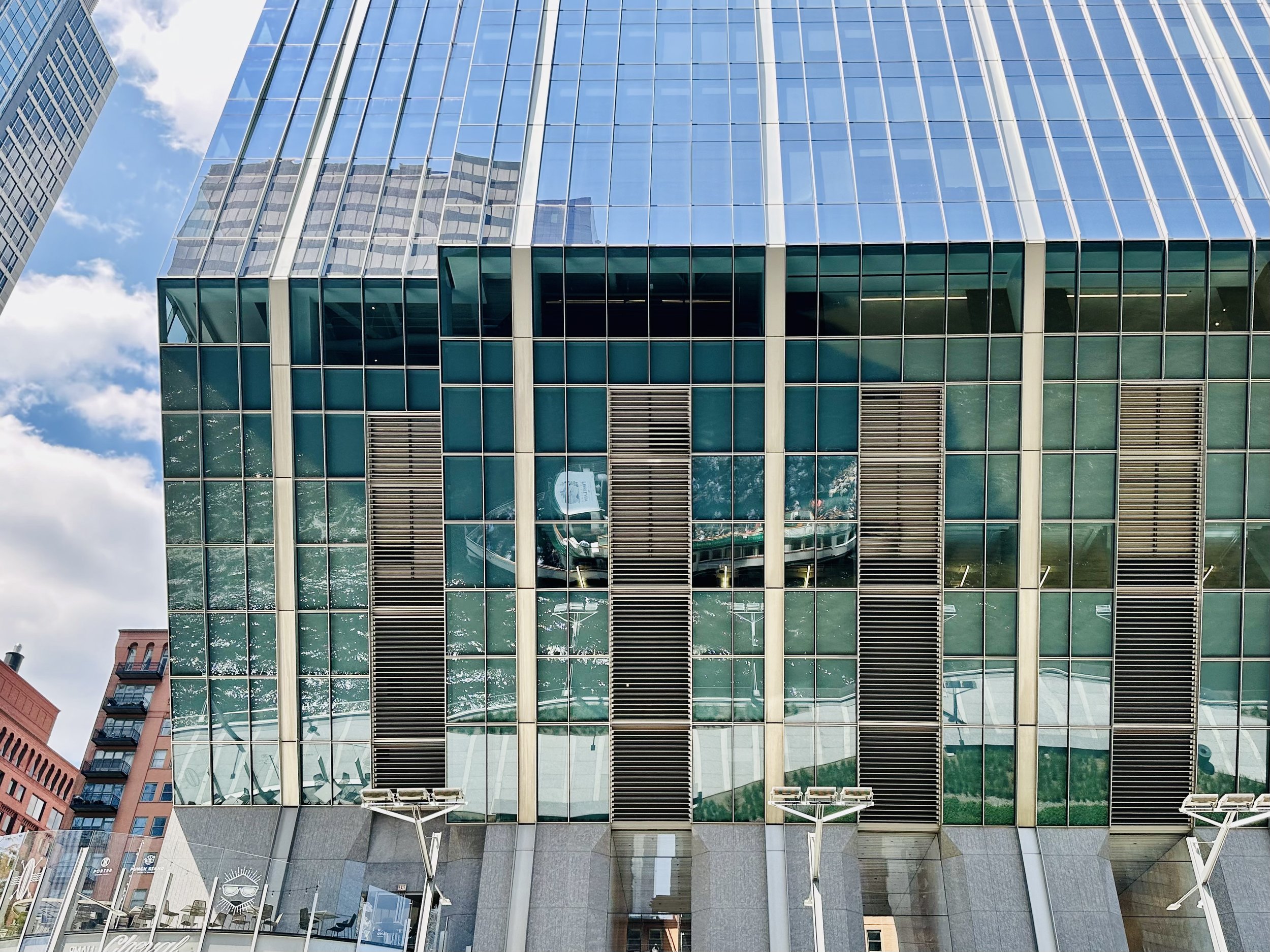 Tour boat selfie in cantilevered façade of 150 North Riverside