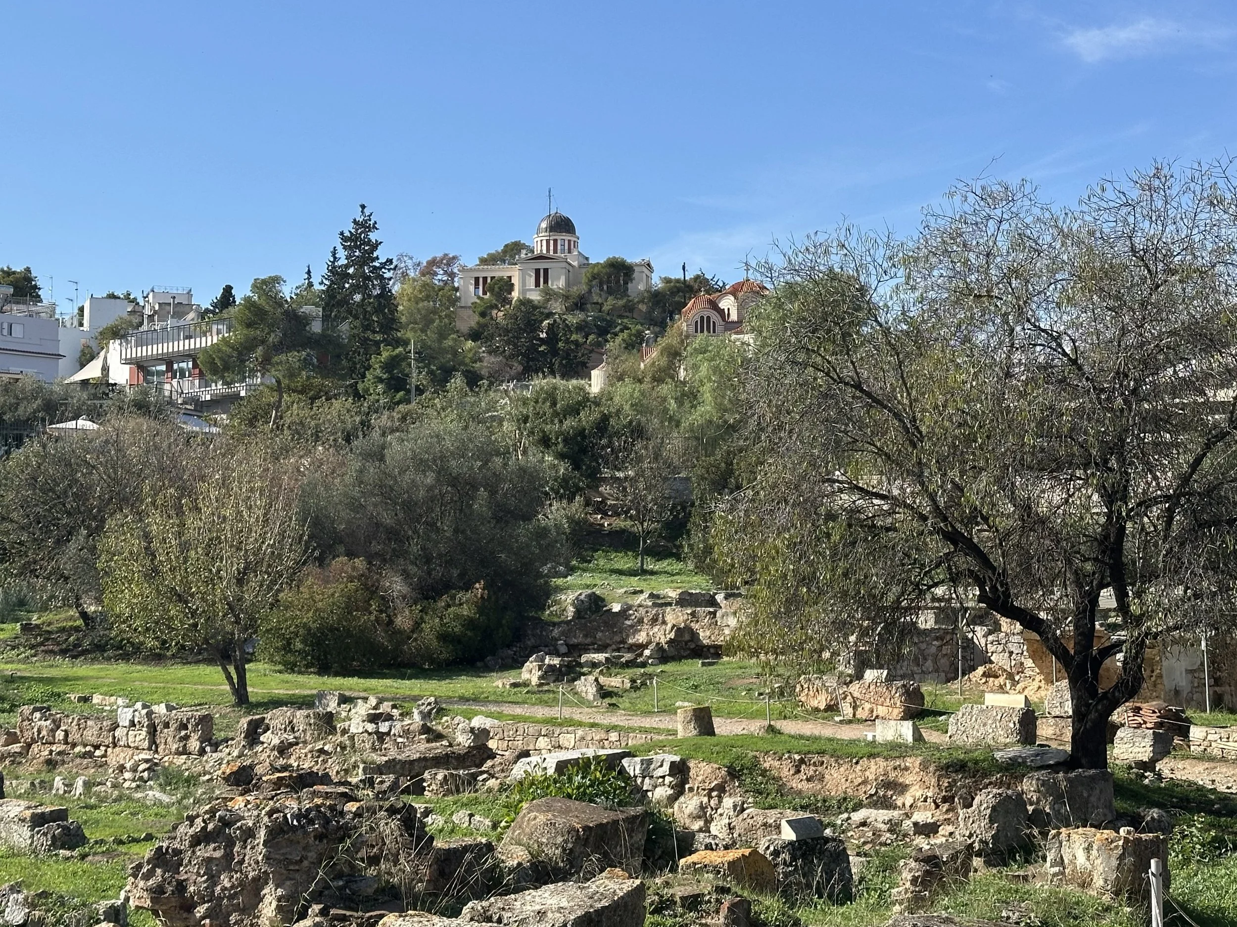 Old Bouleuterion (Council House) with National Observatory in the distance