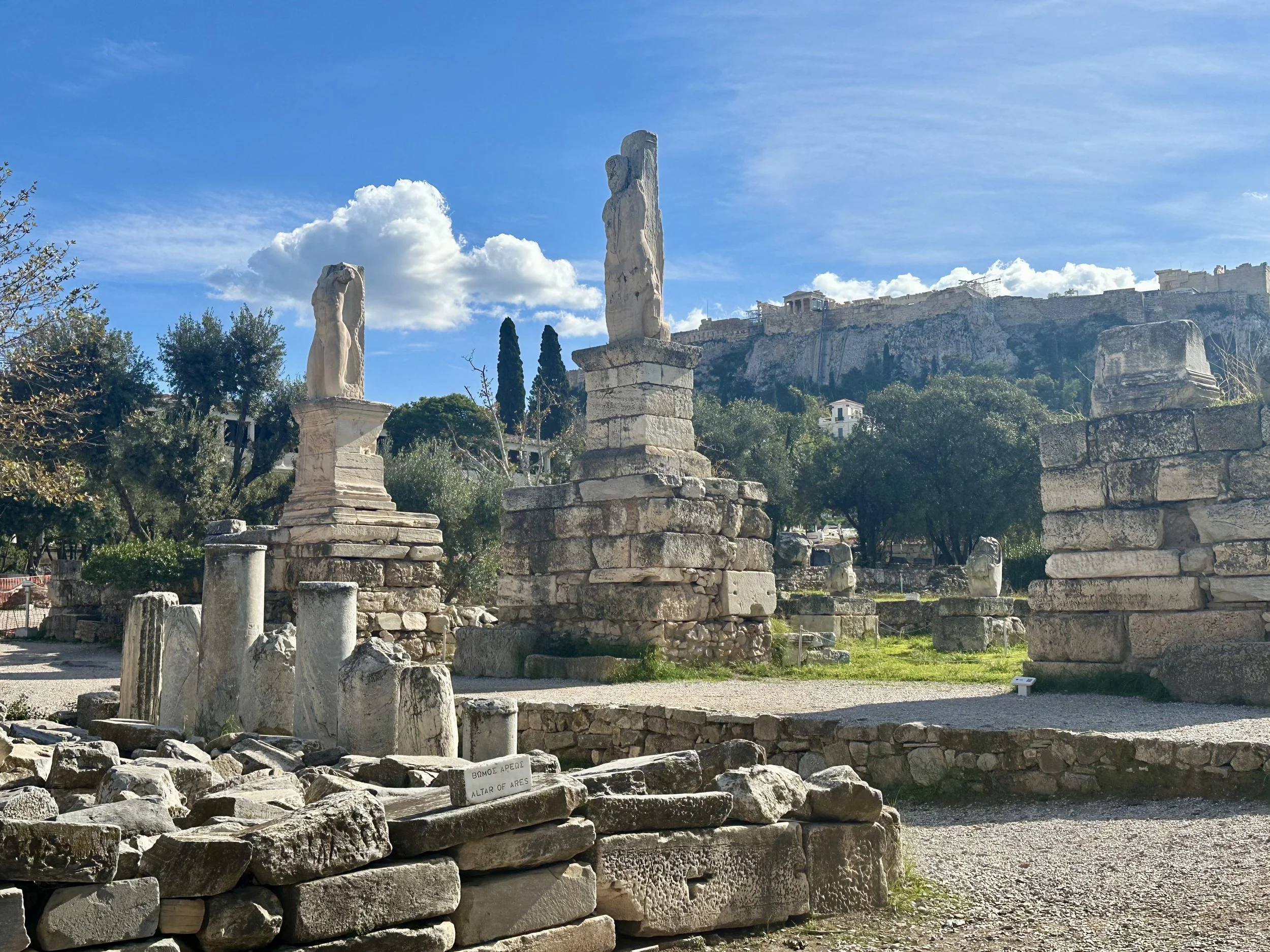 Merman and Triton statues at Odeon of Agrippa