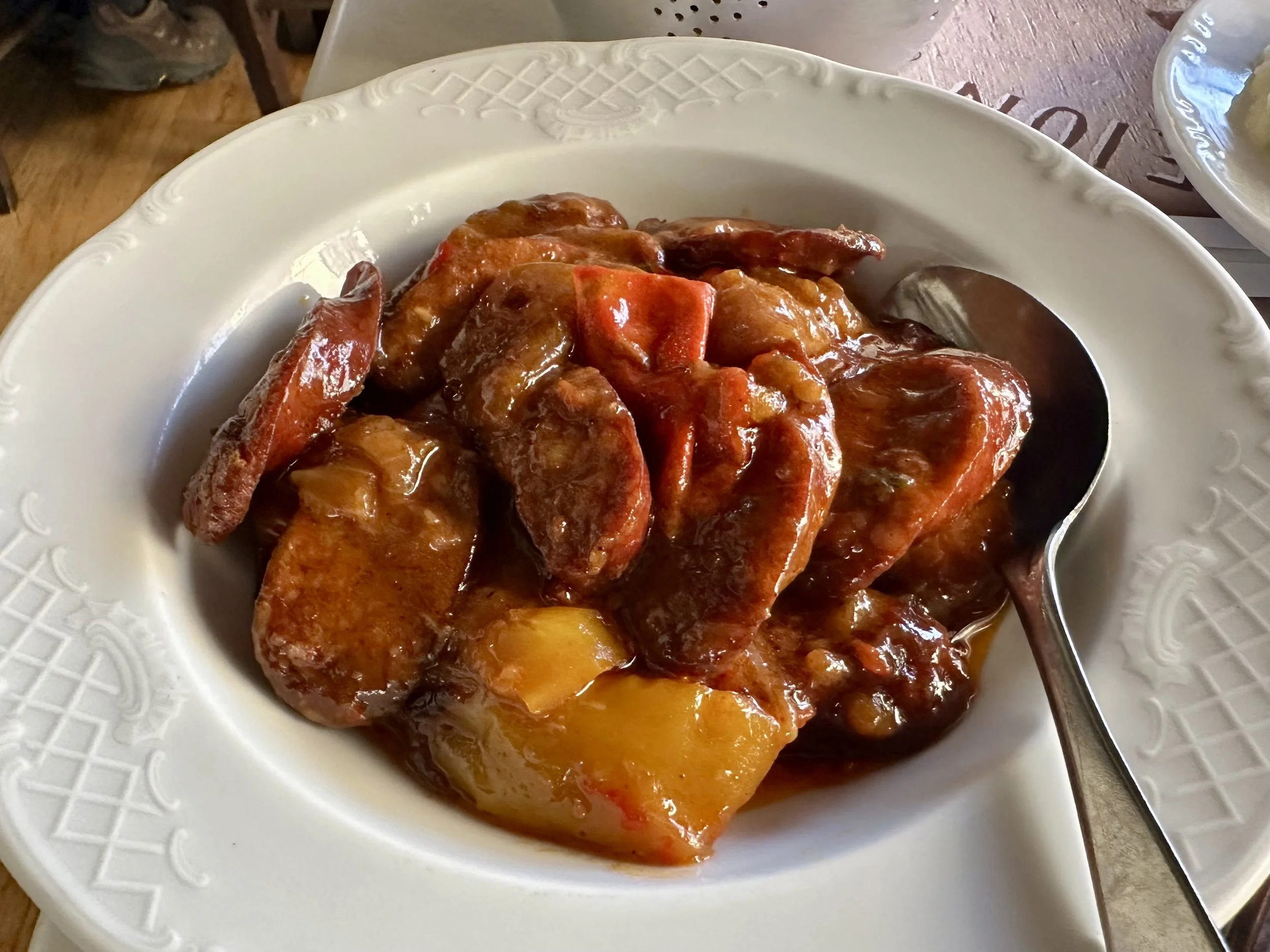 Spetsofai (spicy Greek sausages with peppers and tomato sauce)