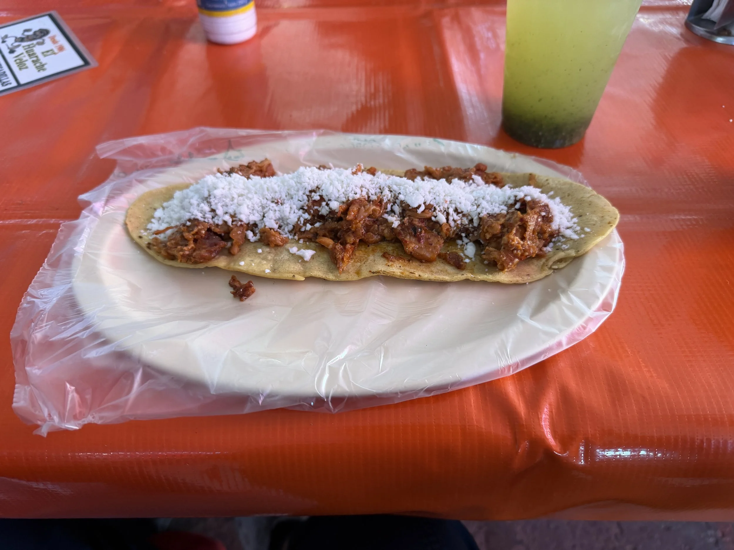 huarache with chicharrón prensado