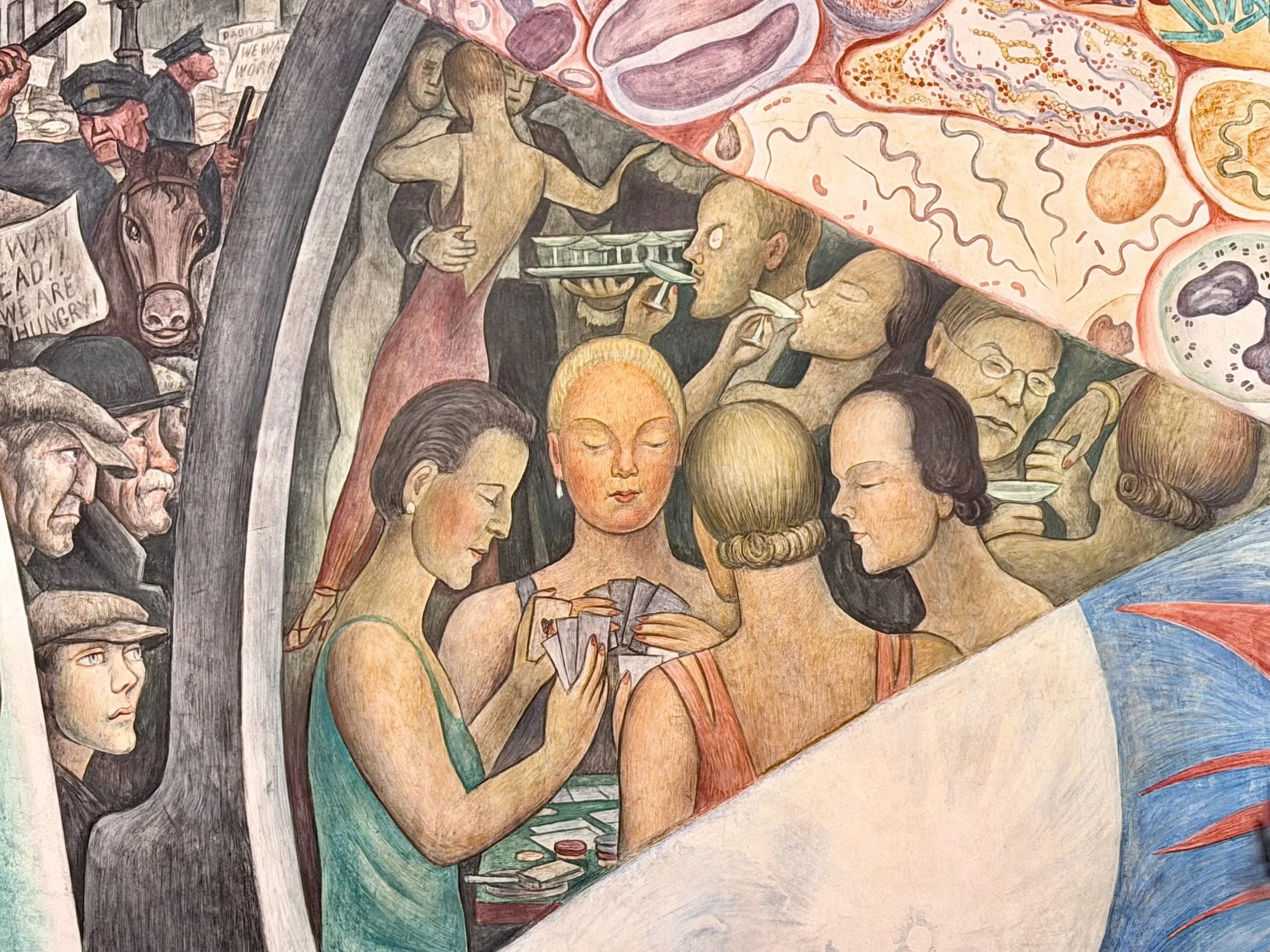  Workers watch wealthy women dance and play cards; John D. Rockefeller holds a martini 