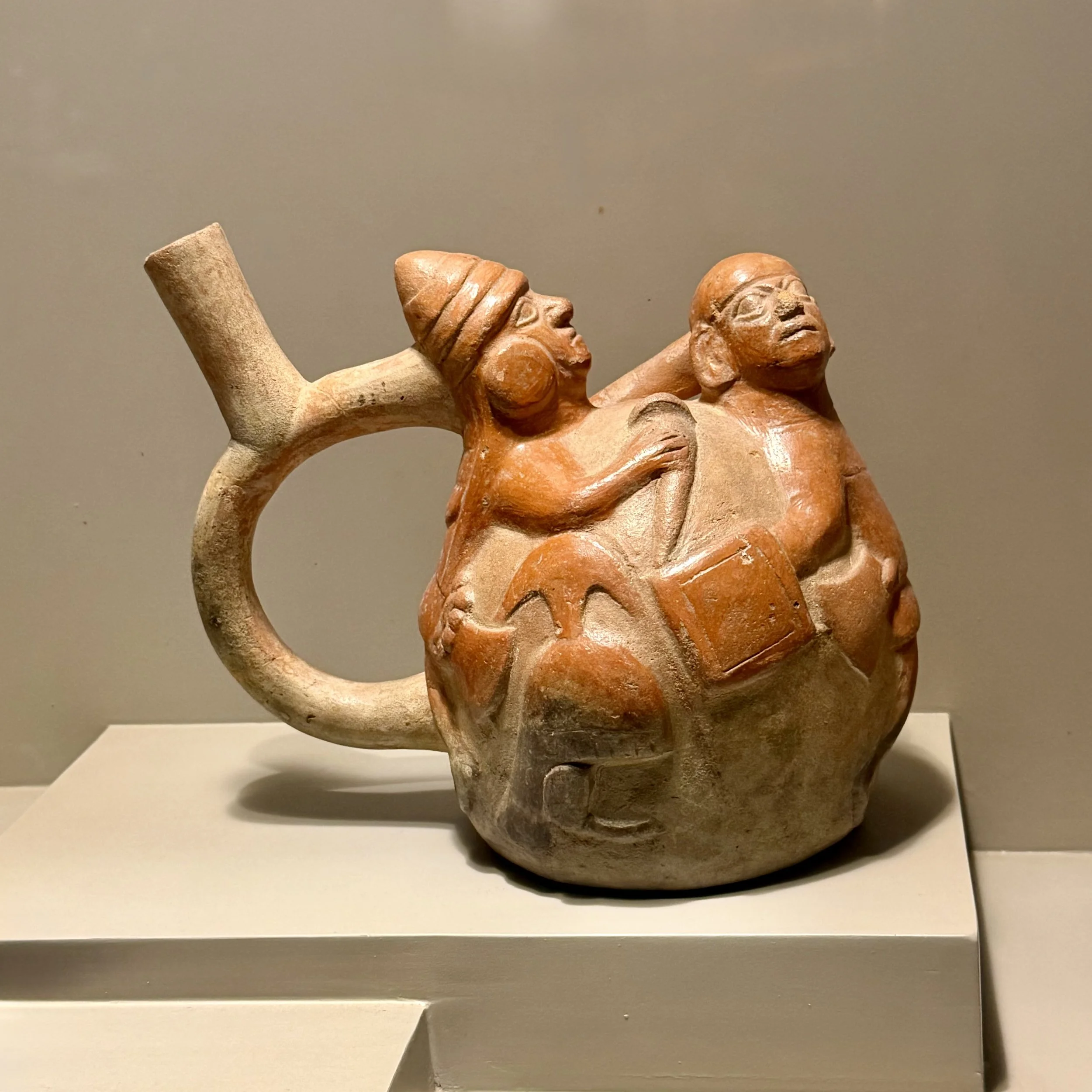  Ceramic stirrup jar with triumphant warrior at left, sacrificial victim at right 