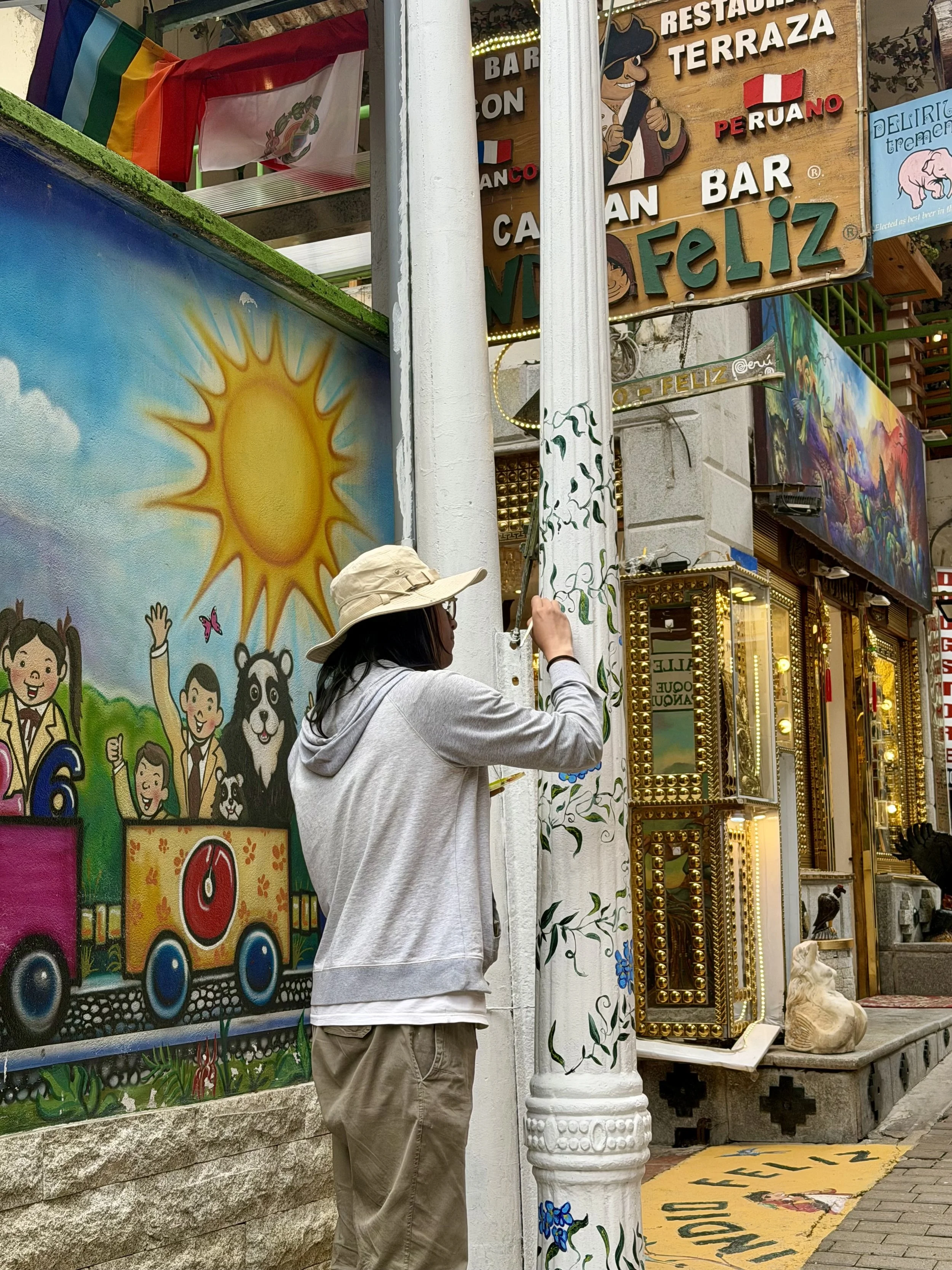 Lamppost artist at work