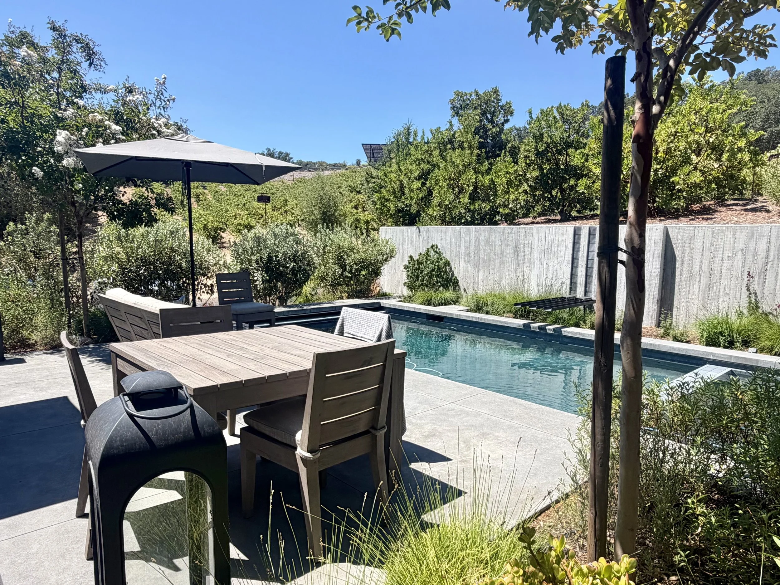 Patio and pool at main entrance to house