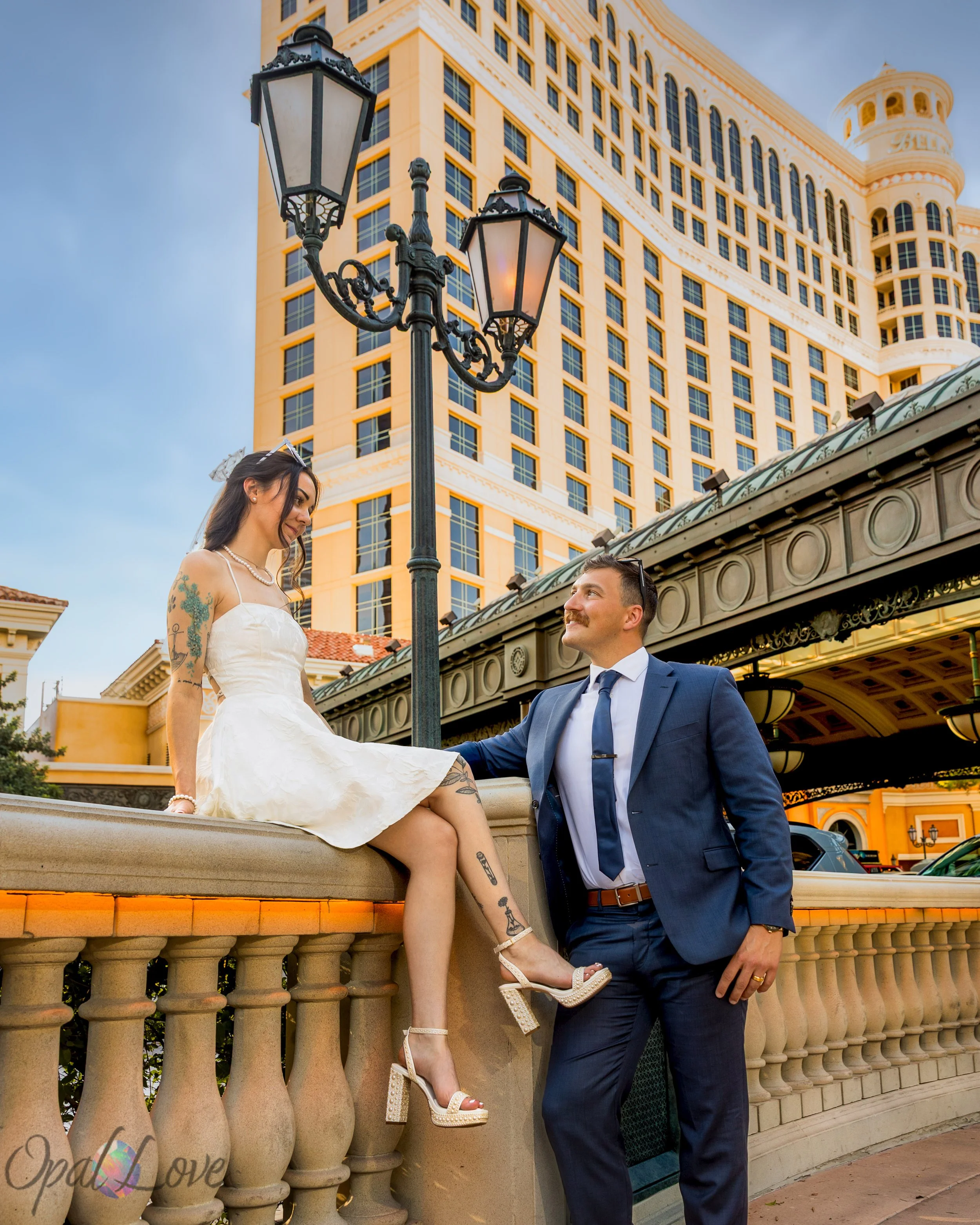 Vegas anniversary photo session with city skyline backdrop