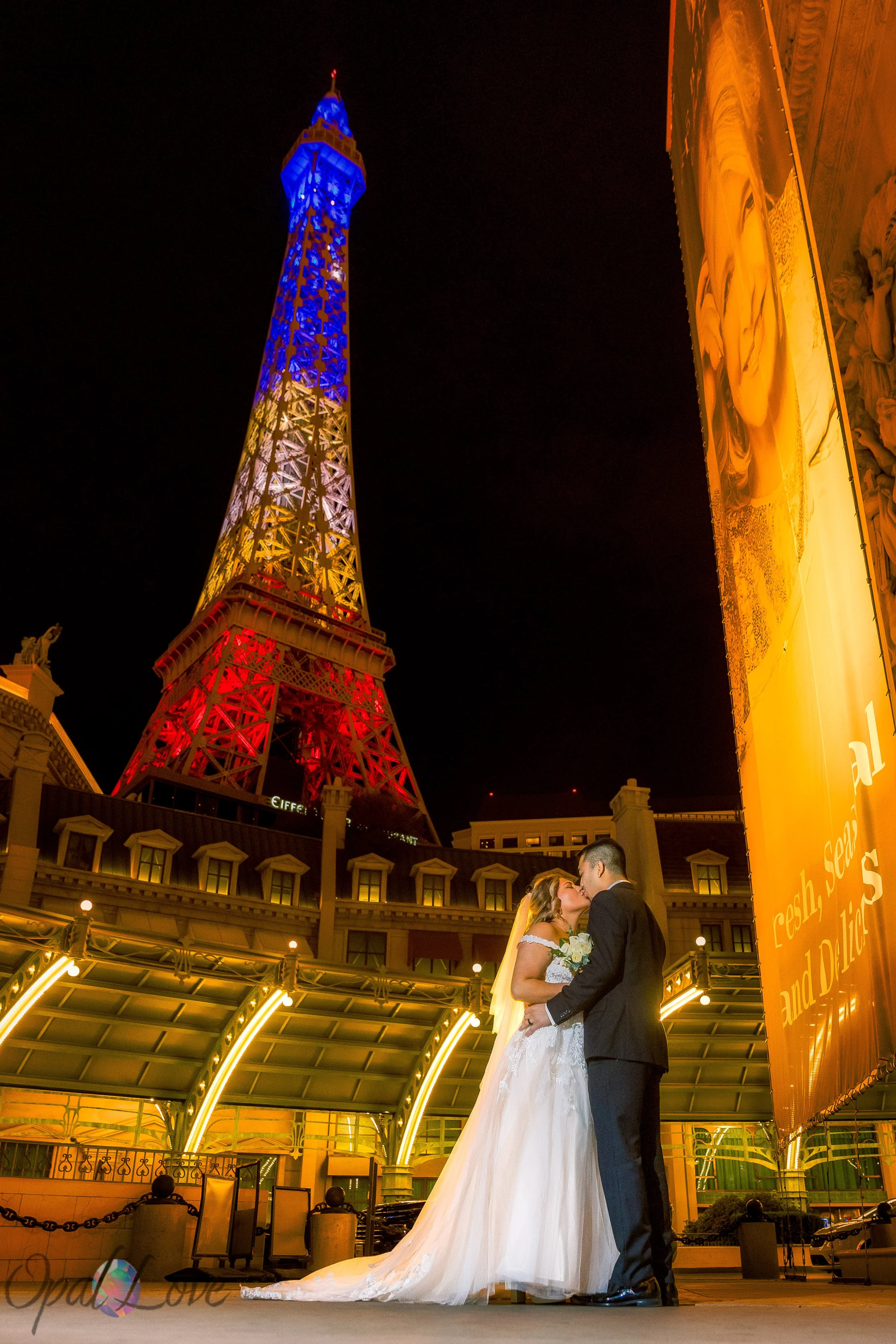 Couple embracing and only the Eiffel Tower on the Las Vegas strip