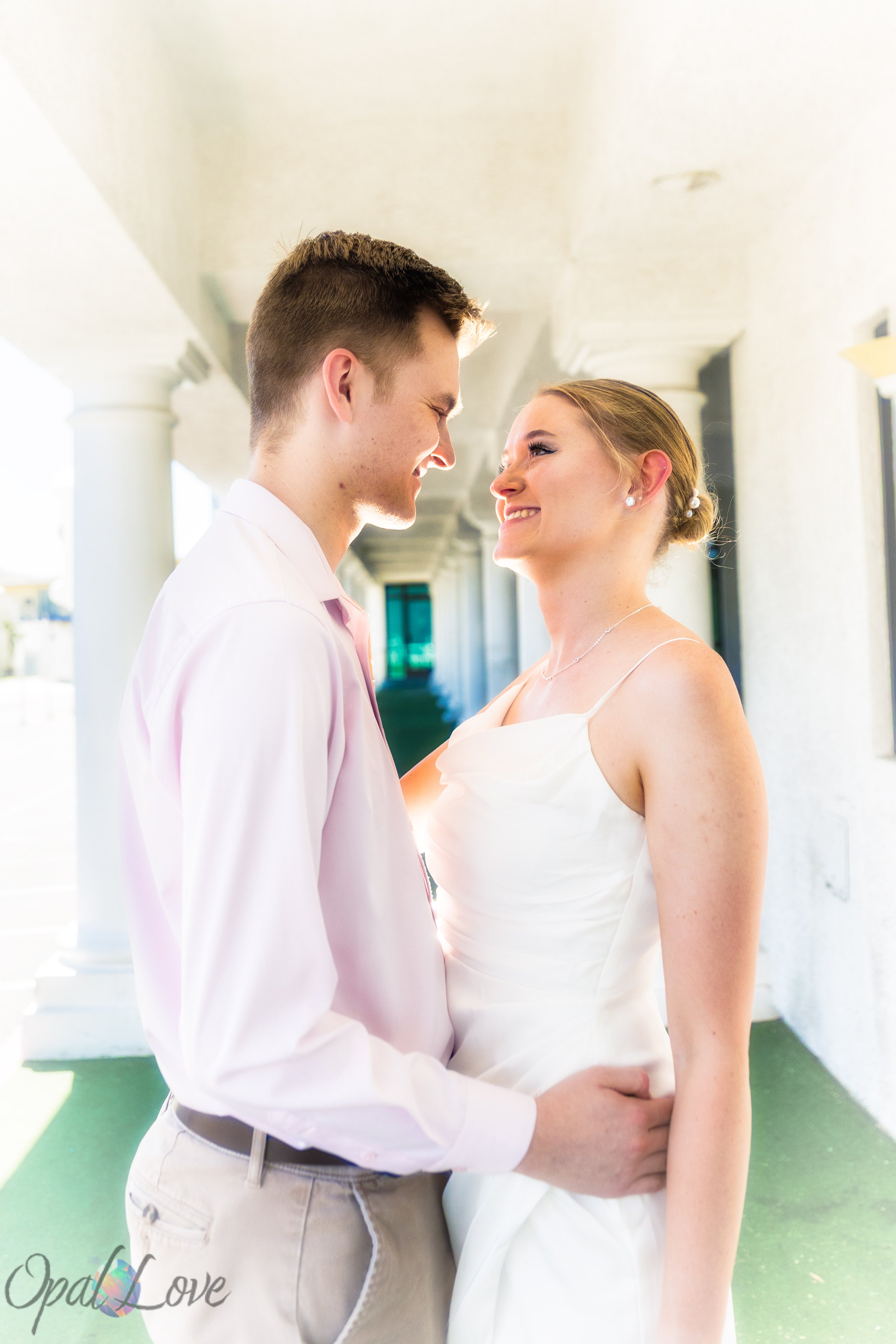Katie and Ryan sharing a quiet moment during their Las Vegas vow renewal at the Little White Wedding Chapel.