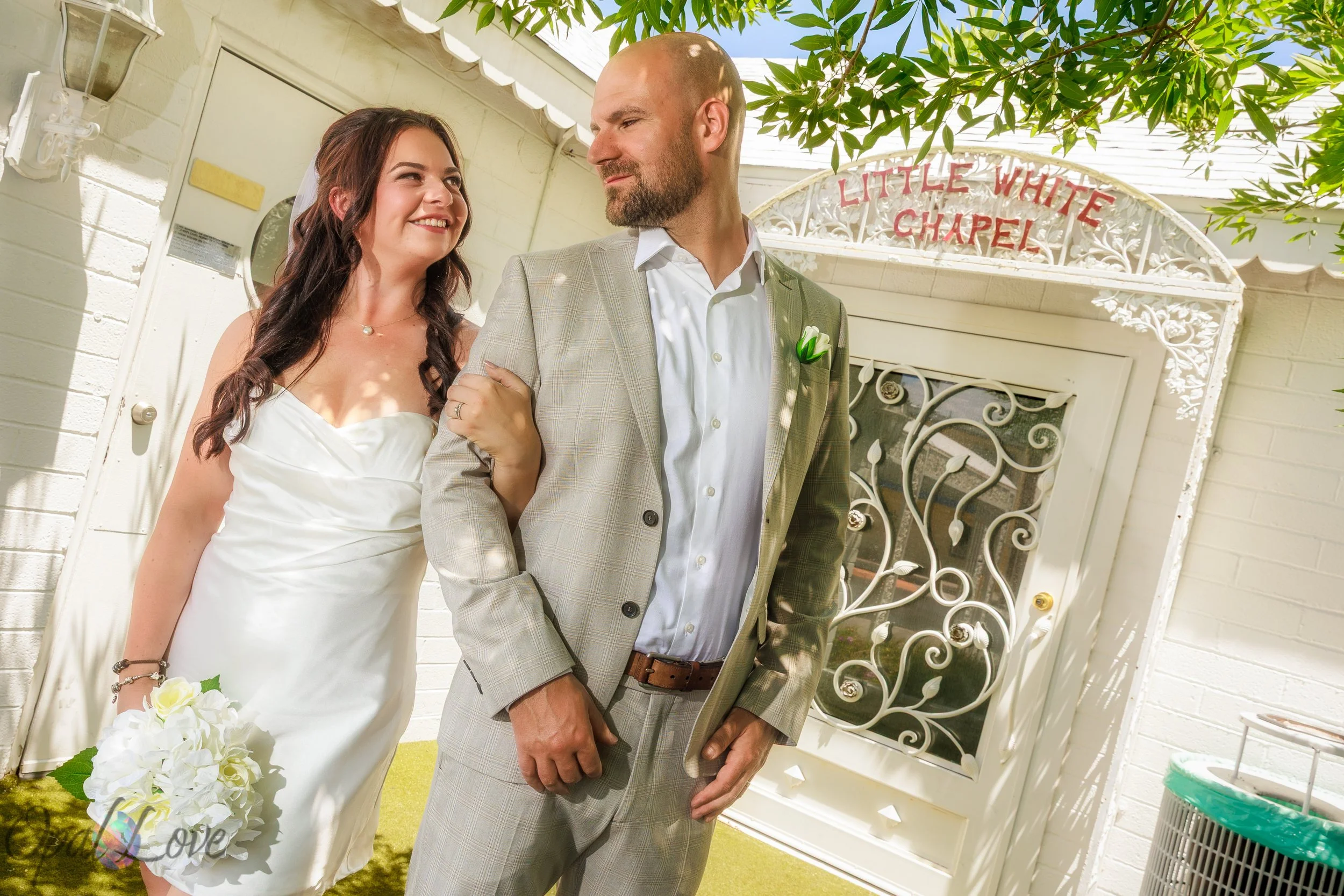 Just married couple walking out of Las Vegas chapel